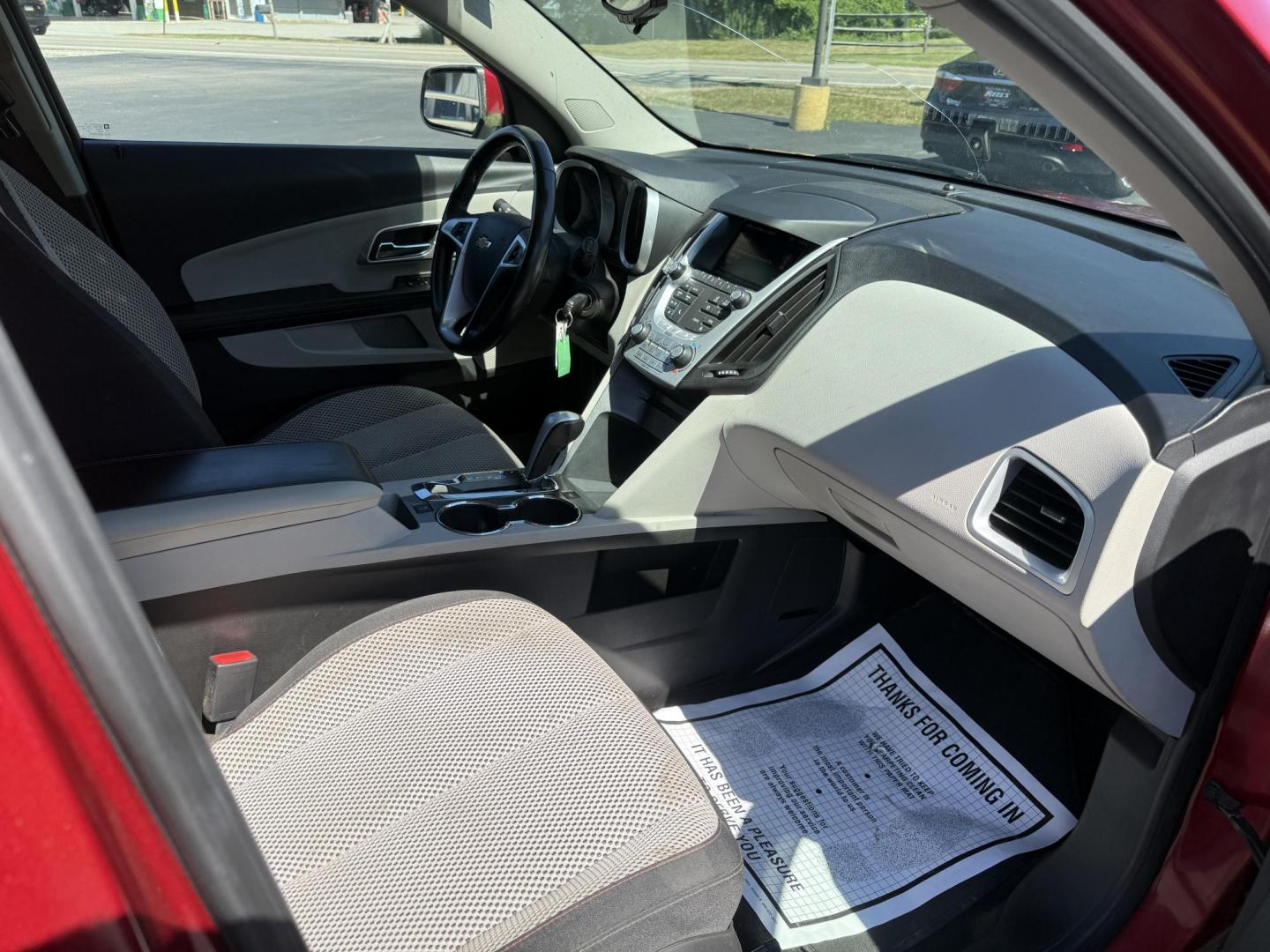 2015 Red /White Chevrolet Equinox 1LT 2WD (2GNALBEK0F6) with an 2.4L I4 DOHC 16V FFV engine, 6-Speed Automatic transmission, located at 11115 Chardon Rd. , Chardon, OH, 44024, (440) 214-9705, 41.580246, -81.241943 - FRESH TRADE ALERT ---- This 2015 Chevrolet Equinox LT 2WD with a 2.4L I4 EcoTec engine and 6-speed automatic transmission offers a solid blend of practicality and comfort, featuring a power driver's seat, daytime running lights, dusk-sensing headlights, remote start, a 7.0-inch touchscreen, and a ba - Photo#36