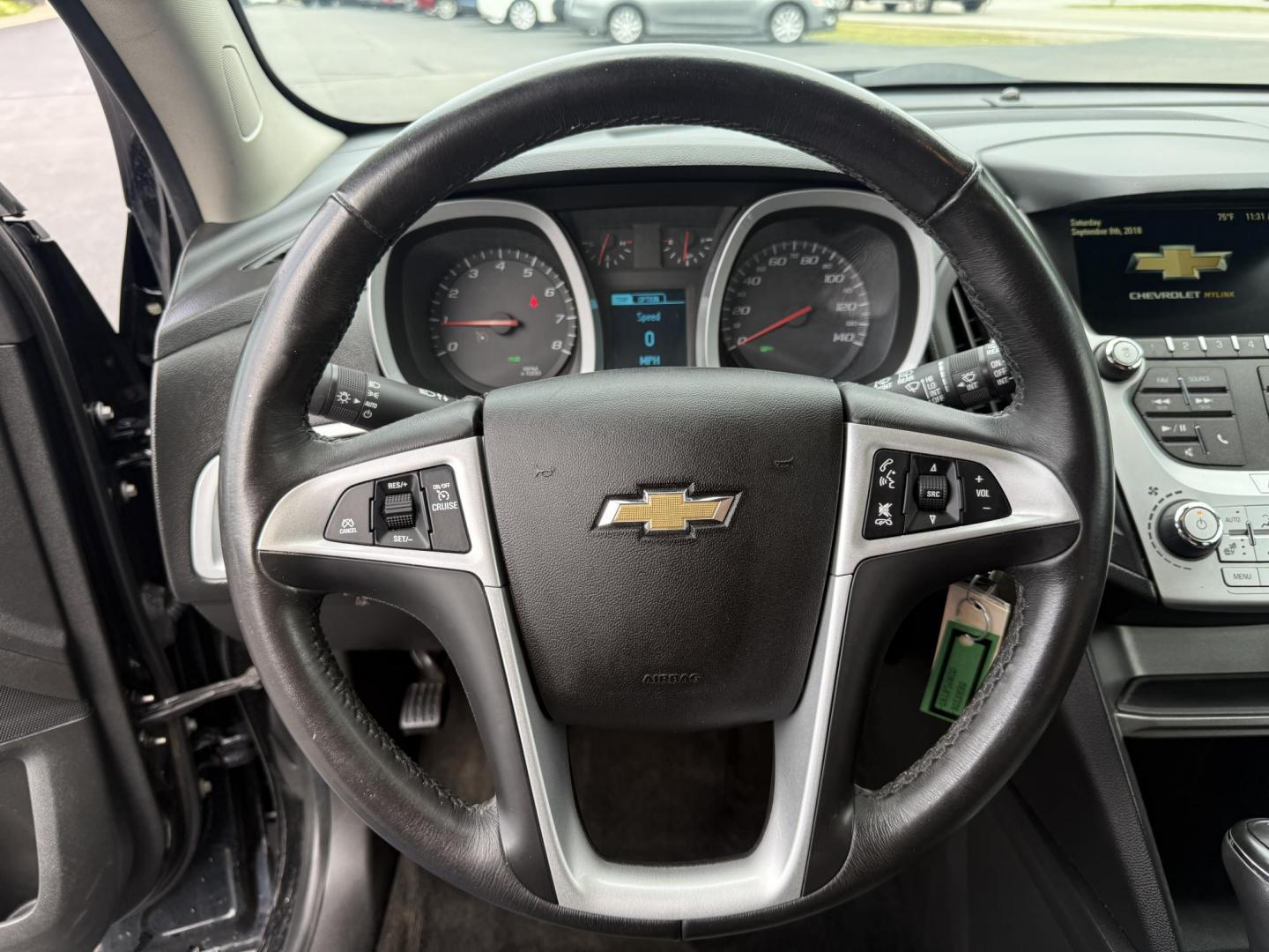 2017 Black /Black Chevrolet Equinox LT AWD (2GNFLFEK8H6) with an 2.4L L4 DOHC 16V FFV engine, 6A transmission, located at 11115 Chardon Rd. , Chardon, OH, 44024, (440) 214-9705, 41.580246, -81.241943 - This 2017 Chevrolet Equinox LT AWD with the 2.4L I4 EcoTec engine offers a reliable and fuel-efficient crossover suited for daily commuting and family use, delivering up to 28 MPG highway. It features a 6-speed automatic transmission, flex-fuel capability, and practical amenities like daytime runnin - Photo#21