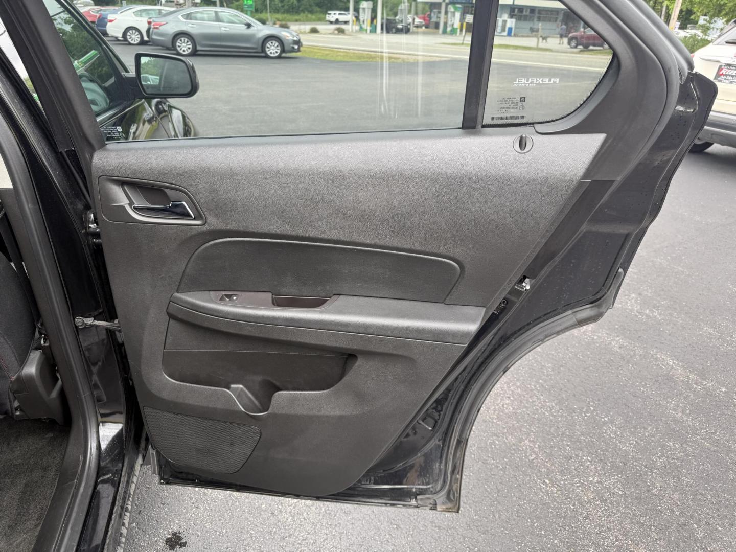 2017 Black /Black Chevrolet Equinox LT AWD (2GNFLFEK8H6) with an 2.4L L4 DOHC 16V FFV engine, 6A transmission, located at 11115 Chardon Rd. , Chardon, OH, 44024, (440) 214-9705, 41.580246, -81.241943 - This 2017 Chevrolet Equinox LT AWD with the 2.4L I4 EcoTec engine offers a reliable and fuel-efficient crossover suited for daily commuting and family use, delivering up to 28 MPG highway. It features a 6-speed automatic transmission, flex-fuel capability, and practical amenities like daytime runnin - Photo#33