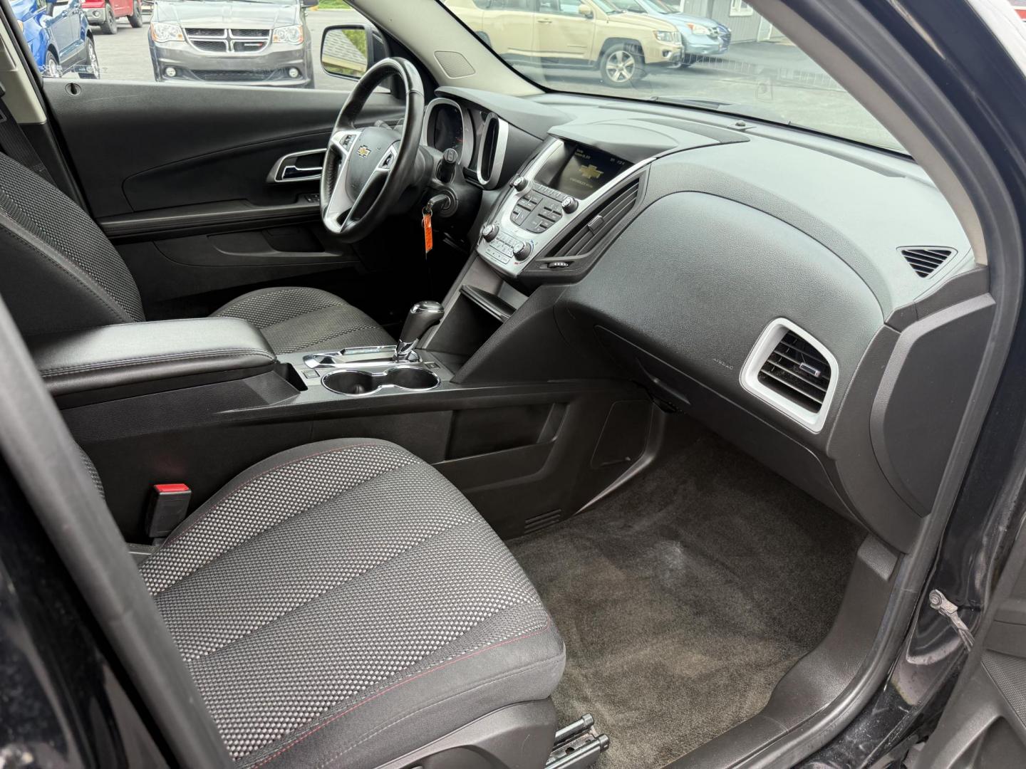 2017 Black /Black Chevrolet Equinox LT AWD (2GNFLFEK8H6) with an 2.4L L4 DOHC 16V FFV engine, 6A transmission, located at 11115 Chardon Rd. , Chardon, OH, 44024, (440) 214-9705, 41.580246, -81.241943 - This 2017 Chevrolet Equinox LT AWD with the 2.4L I4 EcoTec engine offers a reliable and fuel-efficient crossover suited for daily commuting and family use, delivering up to 28 MPG highway. It features a 6-speed automatic transmission, flex-fuel capability, and practical amenities like daytime runnin - Photo#34