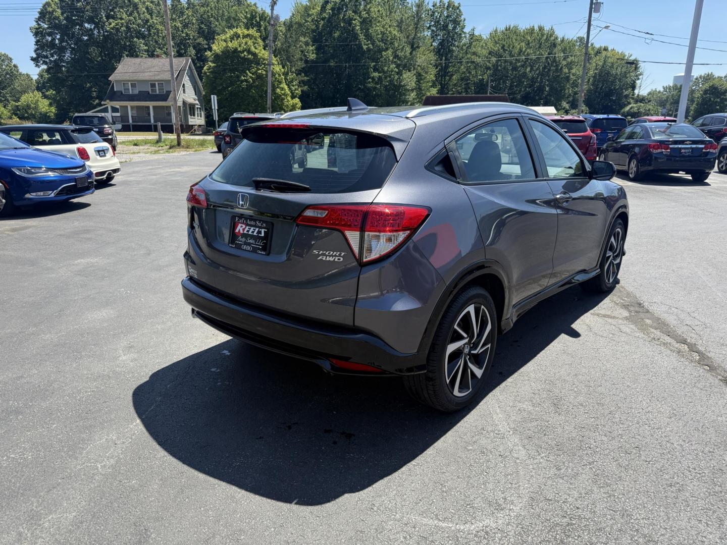 2019 Gray /Black Honda HR-V Sport AWD (3CZRU6H14KG) with an 1.8L I4 DOHC 16V engine, Automatic transmission, located at 547 E. Main St., Orwell, OH, 44076, (440) 437-5893, 41.535435, -80.847855 - This 2019 Honda HR-V Sport AWD offers a versatile and efficient driving experience with its 1.8L I4 engine, sport mode, eco mode, paddle shifters, and an impressive 31 MPG highway fuel economy. It features modern amenities like LED daytime running lights, a 7.0" touchscreen, Apple CarPlay, Android A - Photo#7