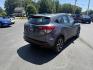 2019 Gray /Black Honda HR-V Sport AWD (3CZRU6H14KG) with an 1.8L I4 DOHC 16V engine, Automatic transmission, located at 547 E. Main St., Orwell, OH, 44076, (440) 437-5893, 41.535435, -80.847855 - This 2019 Honda HR-V Sport AWD offers a versatile and efficient driving experience with its 1.8L I4 engine, sport mode, eco mode, paddle shifters, and an impressive 31 MPG highway fuel economy. It features modern amenities like LED daytime running lights, a 7.0" touchscreen, Apple CarPlay, Android A - Photo#7
