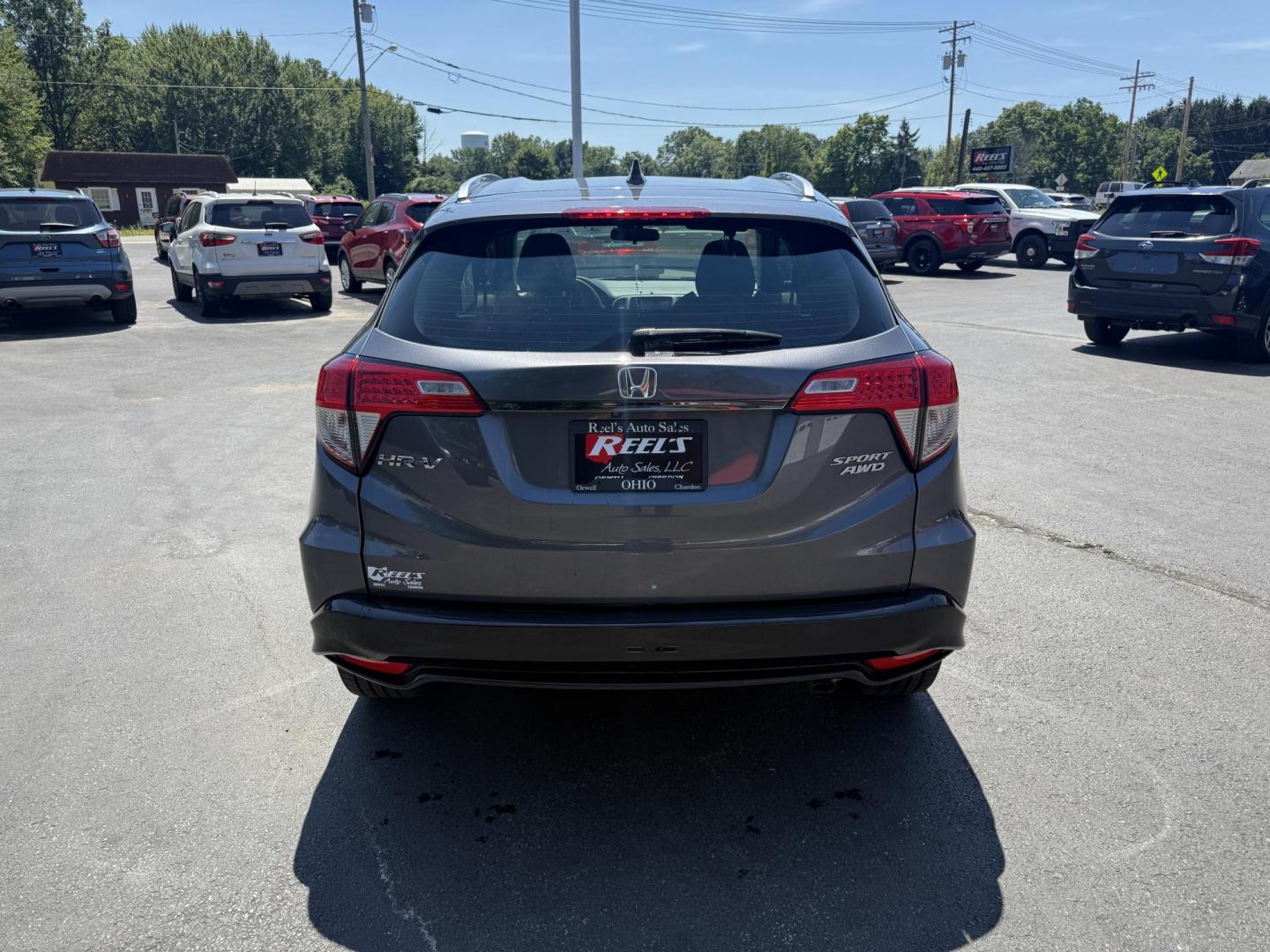 2019 Gray /Black Honda HR-V Sport AWD (3CZRU6H14KG) with an 1.8L I4 DOHC 16V engine, Automatic transmission, located at 547 E. Main St., Orwell, OH, 44076, (440) 437-5893, 41.535435, -80.847855 - This 2019 Honda HR-V Sport AWD offers a versatile and efficient driving experience with its 1.8L I4 engine, sport mode, eco mode, paddle shifters, and an impressive 31 MPG highway fuel economy. It features modern amenities like LED daytime running lights, a 7.0" touchscreen, Apple CarPlay, Android A - Photo#8