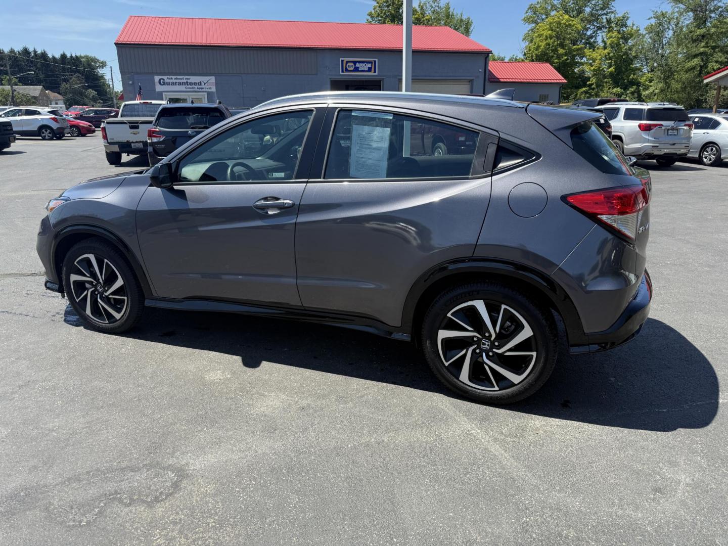 2019 Gray /Black Honda HR-V Sport AWD (3CZRU6H14KG) with an 1.8L I4 DOHC 16V engine, Automatic transmission, located at 547 E. Main St., Orwell, OH, 44076, (440) 437-5893, 41.535435, -80.847855 - This 2019 Honda HR-V Sport AWD offers a versatile and efficient driving experience with its 1.8L I4 engine, sport mode, eco mode, paddle shifters, and an impressive 31 MPG highway fuel economy. It features modern amenities like LED daytime running lights, a 7.0" touchscreen, Apple CarPlay, Android A - Photo#10