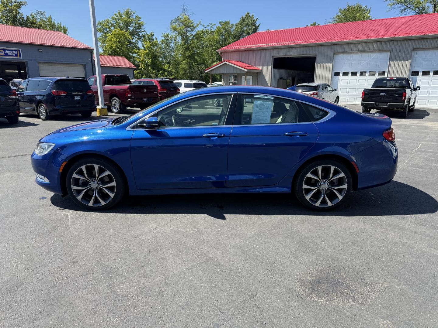 2015 Blue /White Chrysler 200 C (1C3CCCCG2FN) with an 3.6L V6 DOHC 24V engine, 9-Speed Automatic transmission, located at 547 E. Main St., Orwell, OH, 44076, (440) 437-5893, 41.535435, -80.847855 - This 2015 Chrysler 200 C with the 3.6 Pentastar V6 engine offers a compelling blend of performance, comfort, and advanced features, including a 9-speed automatic transmission, leather interior, power front seats, and an 8.4" touchscreen with navigation. It boasts impressive safety and convenience te - Photo#12