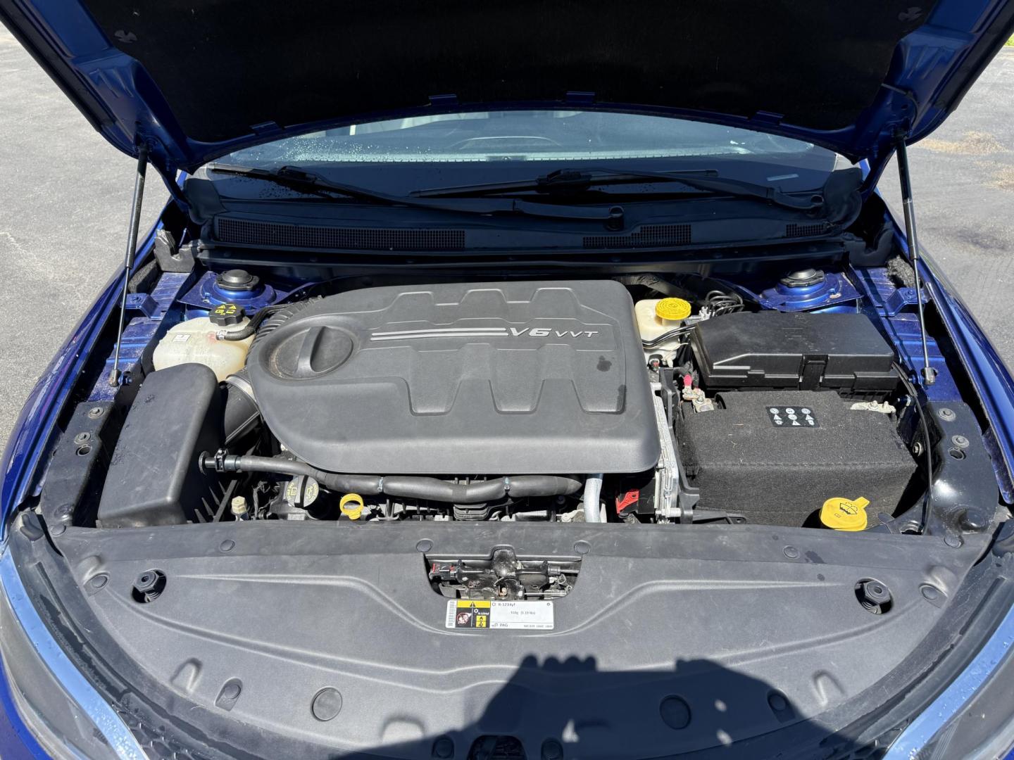 2015 Blue /White Chrysler 200 C (1C3CCCCG2FN) with an 3.6L V6 DOHC 24V engine, 9-Speed Automatic transmission, located at 547 E. Main St., Orwell, OH, 44076, (440) 437-5893, 41.535435, -80.847855 - This 2015 Chrysler 200 C with the 3.6 Pentastar V6 engine offers a compelling blend of performance, comfort, and advanced features, including a 9-speed automatic transmission, leather interior, power front seats, and an 8.4" touchscreen with navigation. It boasts impressive safety and convenience te - Photo#14