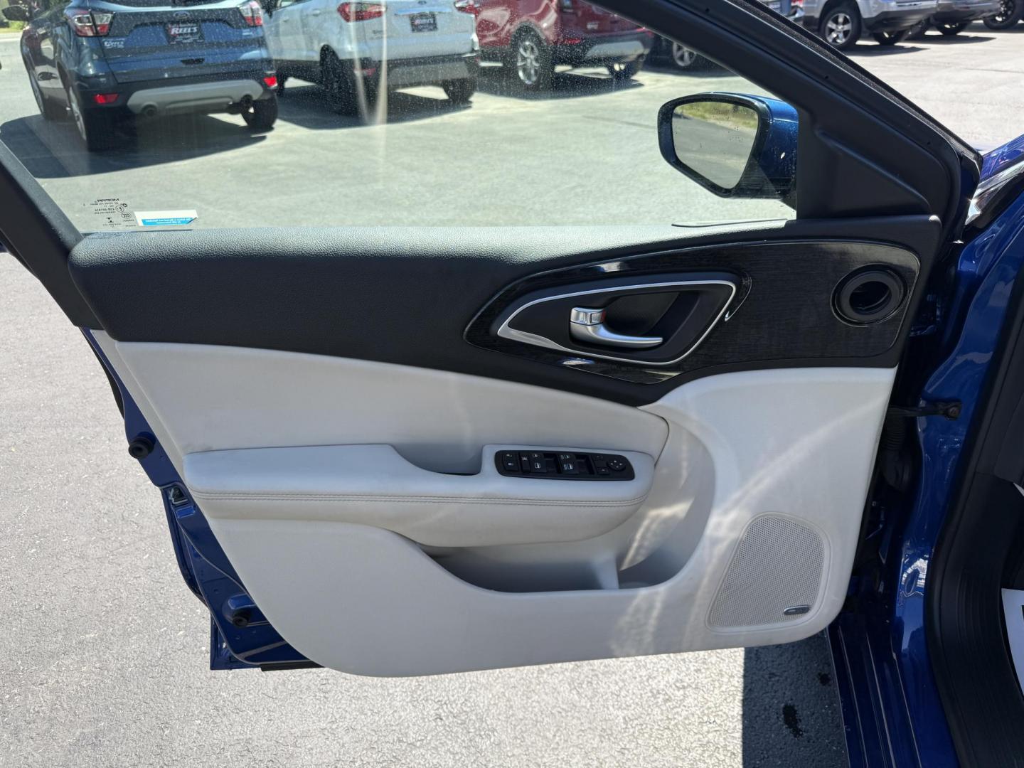 2015 Blue /White Chrysler 200 C (1C3CCCCG2FN) with an 3.6L V6 DOHC 24V engine, 9-Speed Automatic transmission, located at 547 E. Main St., Orwell, OH, 44076, (440) 437-5893, 41.535435, -80.847855 - This 2015 Chrysler 200 C with the 3.6 Pentastar V6 engine offers a compelling blend of performance, comfort, and advanced features, including a 9-speed automatic transmission, leather interior, power front seats, and an 8.4" touchscreen with navigation. It boasts impressive safety and convenience te - Photo#16