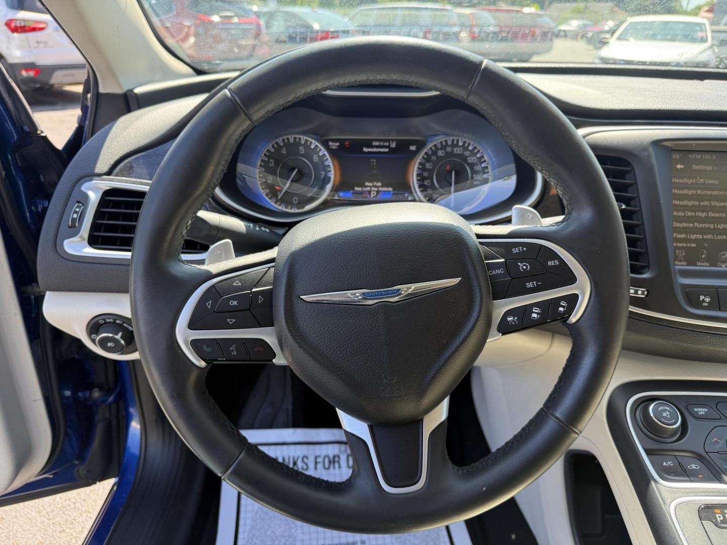2015 Blue /White Chrysler 200 C (1C3CCCCG2FN) with an 3.6L V6 DOHC 24V engine, 9-Speed Automatic transmission, located at 547 E. Main St., Orwell, OH, 44076, (440) 437-5893, 41.535435, -80.847855 - This 2015 Chrysler 200 C with the 3.6 Pentastar V6 engine offers a compelling blend of performance, comfort, and advanced features, including a 9-speed automatic transmission, leather interior, power front seats, and an 8.4" touchscreen with navigation. It boasts impressive safety and convenience te - Photo#23
