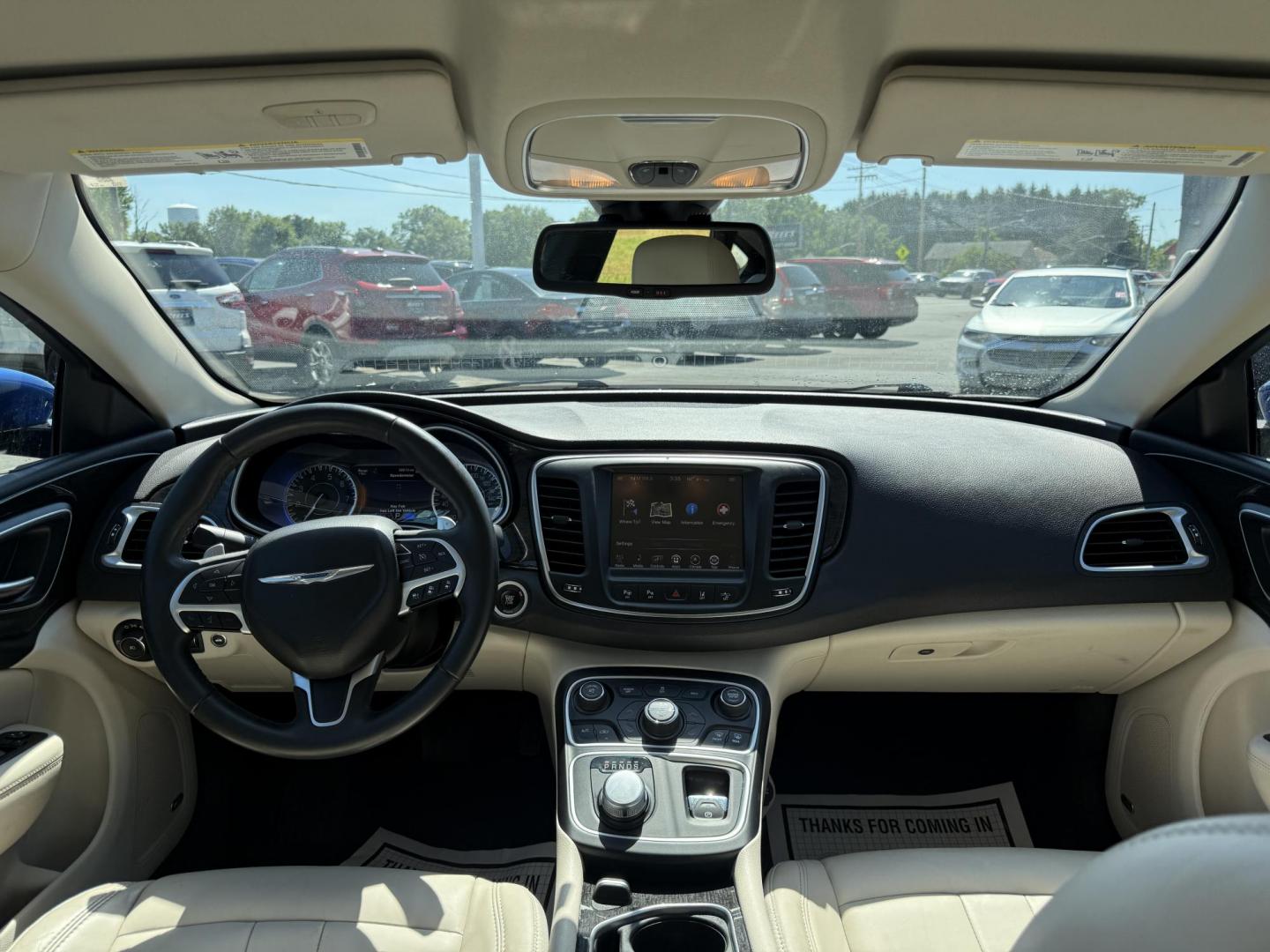2015 Blue /White Chrysler 200 C (1C3CCCCG2FN) with an 3.6L V6 DOHC 24V engine, 9-Speed Automatic transmission, located at 547 E. Main St., Orwell, OH, 44076, (440) 437-5893, 41.535435, -80.847855 - This 2015 Chrysler 200 C with the 3.6 Pentastar V6 engine offers a compelling blend of performance, comfort, and advanced features, including a 9-speed automatic transmission, leather interior, power front seats, and an 8.4" touchscreen with navigation. It boasts impressive safety and convenience te - Photo#37