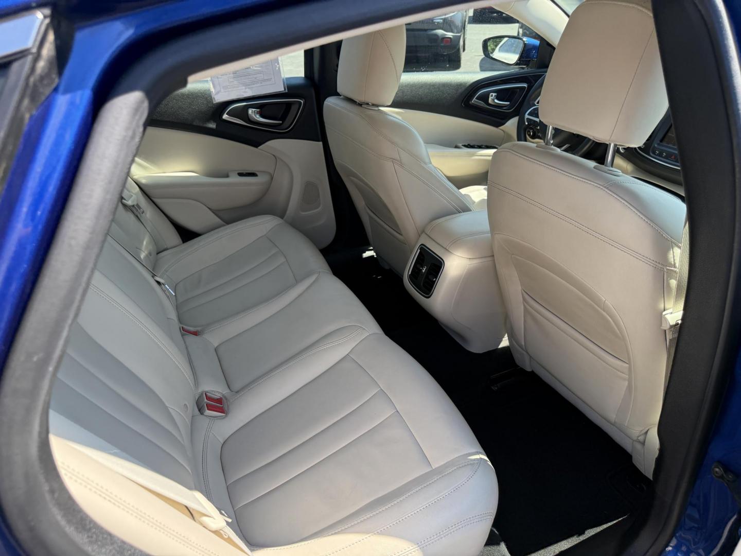 2015 Blue /White Chrysler 200 C (1C3CCCCG2FN) with an 3.6L V6 DOHC 24V engine, 9-Speed Automatic transmission, located at 547 E. Main St., Orwell, OH, 44076, (440) 437-5893, 41.535435, -80.847855 - This 2015 Chrysler 200 C with the 3.6 Pentastar V6 engine offers a compelling blend of performance, comfort, and advanced features, including a 9-speed automatic transmission, leather interior, power front seats, and an 8.4" touchscreen with navigation. It boasts impressive safety and convenience te - Photo#40