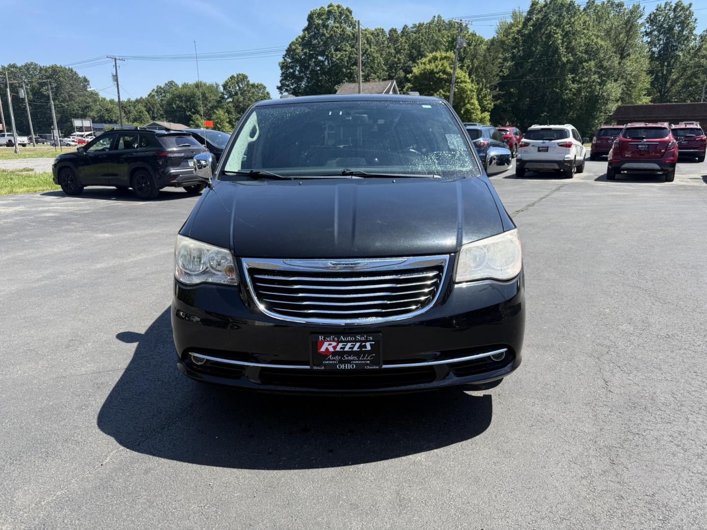 2014 Black /Black Chrysler Town & Country Touring-L (2C4RC1CG9ER) with an 3.6L V6 DOHC 24V FFV engine, 6-Speed Automatic transmission, located at 547 E. Main St., Orwell, OH, 44076, (440) 437-5893, 41.535435, -80.847855 - Photo#1
