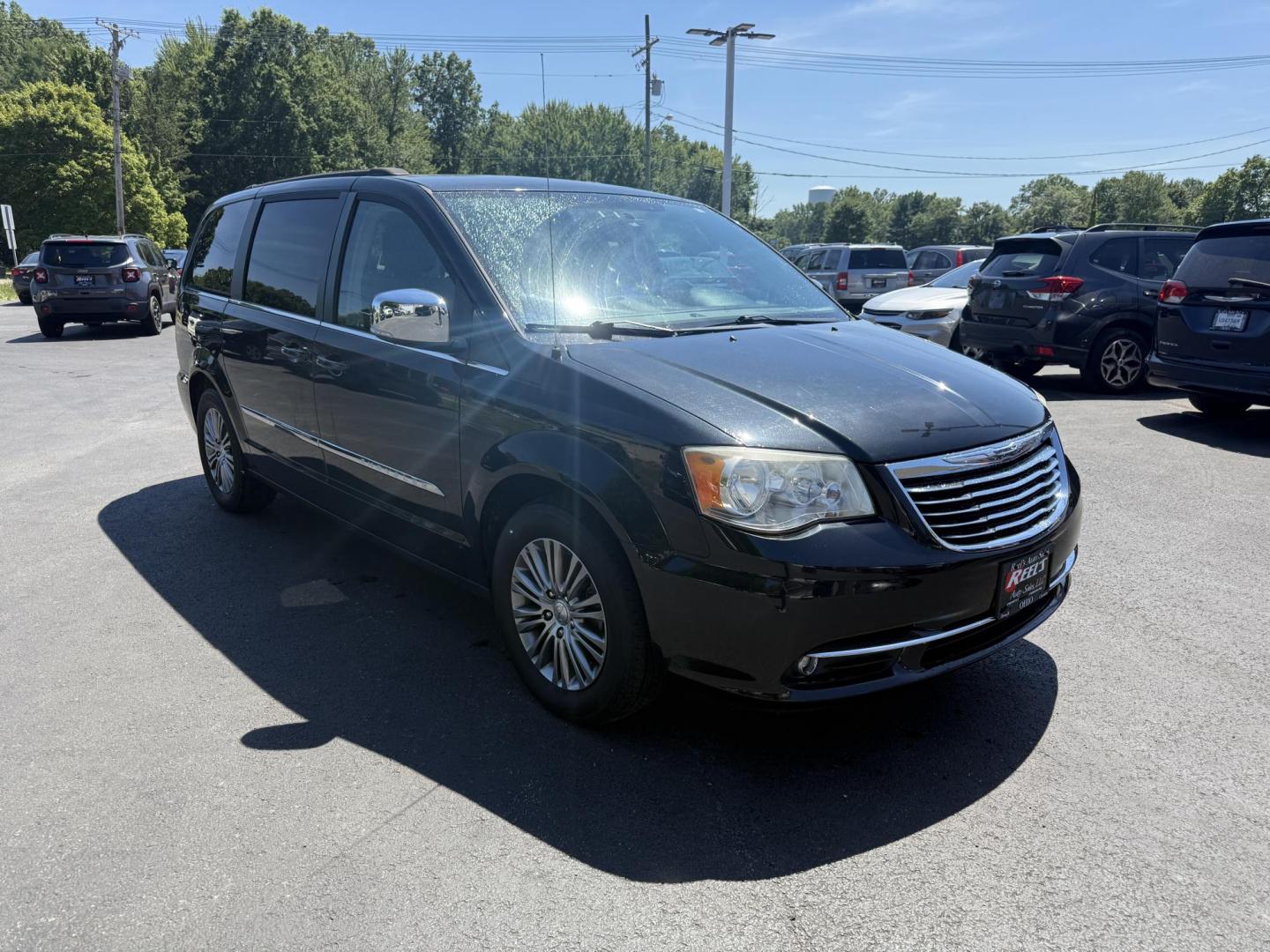 2014 Black /Black Chrysler Town & Country Touring-L (2C4RC1CG9ER) with an 3.6L V6 DOHC 24V FFV engine, 6-Speed Automatic transmission, located at 547 E. Main St., Orwell, OH, 44076, (440) 437-5893, 41.535435, -80.847855 - Photo#2