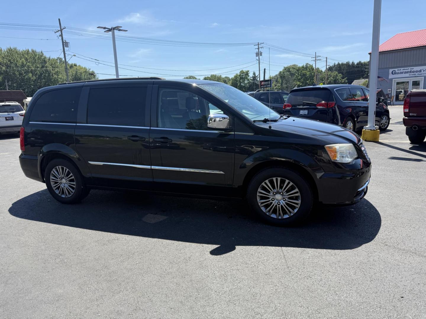 2014 Black /Black Chrysler Town & Country Touring-L (2C4RC1CG9ER) with an 3.6L V6 DOHC 24V FFV engine, 6-Speed Automatic transmission, located at 547 E. Main St., Orwell, OH, 44076, (440) 437-5893, 41.535435, -80.847855 - Photo#3
