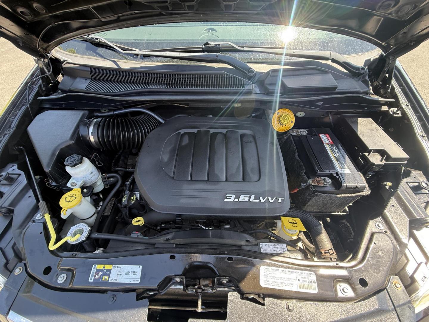 2014 Black /Black Chrysler Town & Country Touring-L (2C4RC1CG9ER) with an 3.6L V6 DOHC 24V FFV engine, 6-Speed Automatic transmission, located at 547 E. Main St., Orwell, OH, 44076, (440) 437-5893, 41.535435, -80.847855 - Photo#14