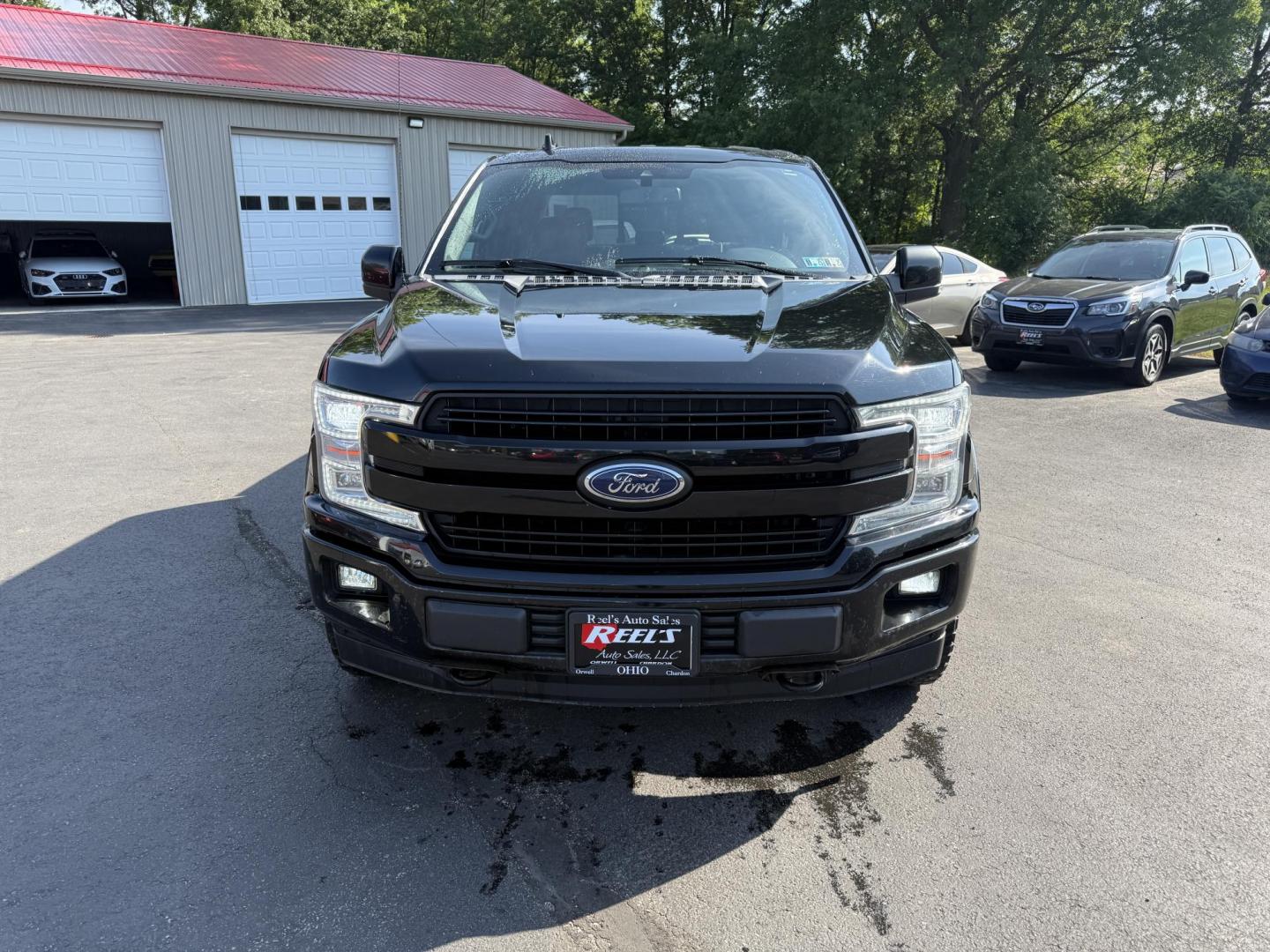 2018 Black /Black Ford F-150 Lariat SuperCrew 5.5-ft. 4WD (1FTEW1E54JF) with an 5.0L V8 OHV 32V FFV engine, 10 Speed Auto transmission, located at 11115 Chardon Rd. , Chardon, OH, 44024, (440) 214-9705, 41.580246, -81.241943 - This 2018 Ford F-150 Lariat Crew Cab 4WD, equipped with the 5.0L Coyote V8 and 10-speed automatic transmission, blends strong performance (395 hp, 400 lb-ft) with luxury features like leather, heated/cooled power seats, dual-zone climate, and advanced tech (Apple CarPlay, Android Auto, navigation). - Photo#1