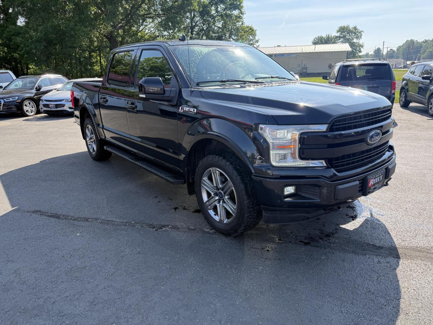2018 Black /Black Ford F-150 Lariat SuperCrew 5.5-ft. 4WD (1FTEW1E54JF) with an 5.0L V8 OHV 32V FFV engine, 10 Speed Auto transmission, located at 11115 Chardon Rd. , Chardon, OH, 44024, (440) 214-9705, 41.580246, -81.241943 - This 2018 Ford F-150 Lariat Crew Cab 4WD, equipped with the 5.0L Coyote V8 and 10-speed automatic transmission, blends strong performance (395 hp, 400 lb-ft) with luxury features like leather, heated/cooled power seats, dual-zone climate, and advanced tech (Apple CarPlay, Android Auto, navigation). - Photo#2