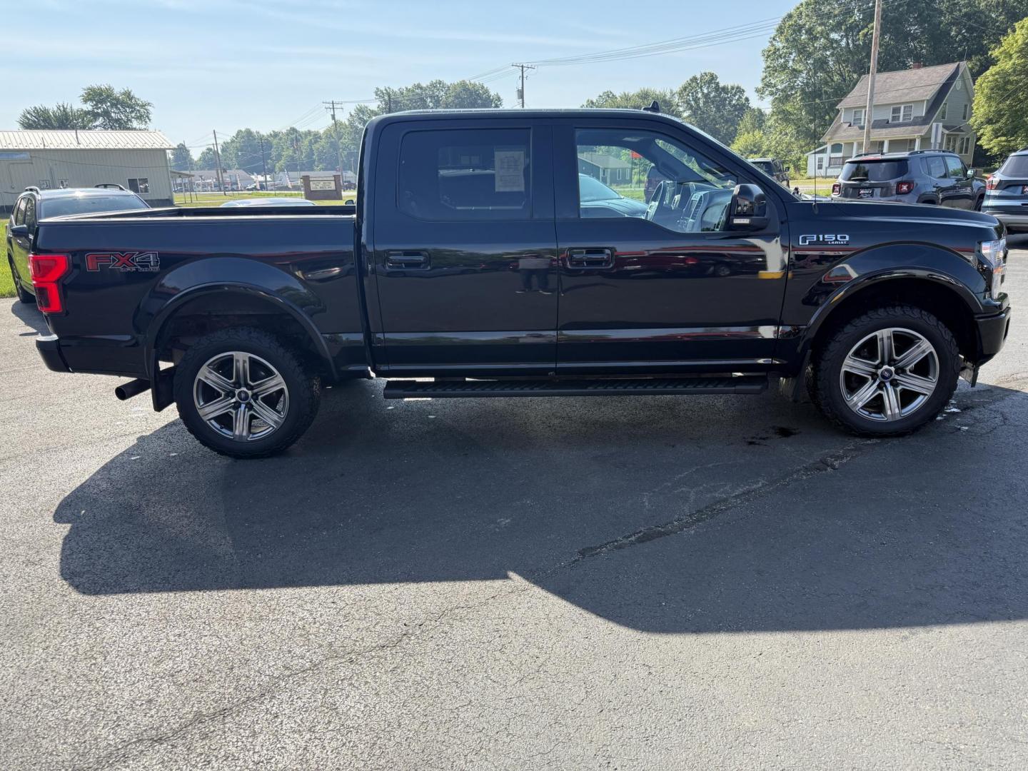 2018 Black /Black Ford F-150 Lariat SuperCrew 5.5-ft. 4WD (1FTEW1E54JF) with an 5.0L V8 OHV 32V FFV engine, 10 Speed Auto transmission, located at 11115 Chardon Rd. , Chardon, OH, 44024, (440) 214-9705, 41.580246, -81.241943 - This 2018 Ford F-150 Lariat Crew Cab 4WD, equipped with the 5.0L Coyote V8 and 10-speed automatic transmission, blends strong performance (395 hp, 400 lb-ft) with luxury features like leather, heated/cooled power seats, dual-zone climate, and advanced tech (Apple CarPlay, Android Auto, navigation). - Photo#6