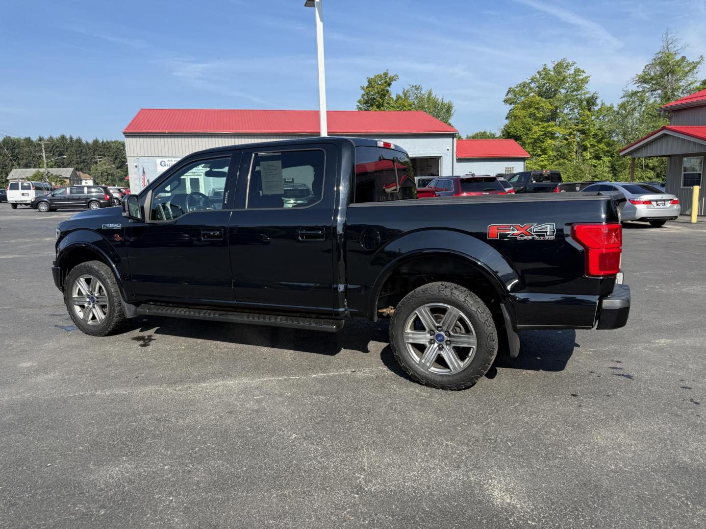 2018 Black /Black Ford F-150 Lariat SuperCrew 5.5-ft. 4WD (1FTEW1E54JF) with an 5.0L V8 OHV 32V FFV engine, 10 Speed Auto transmission, located at 11115 Chardon Rd. , Chardon, OH, 44024, (440) 214-9705, 41.580246, -81.241943 - This 2018 Ford F-150 Lariat Crew Cab 4WD, equipped with the 5.0L Coyote V8 and 10-speed automatic transmission, blends strong performance (395 hp, 400 lb-ft) with luxury features like leather, heated/cooled power seats, dual-zone climate, and advanced tech (Apple CarPlay, Android Auto, navigation). - Photo#12