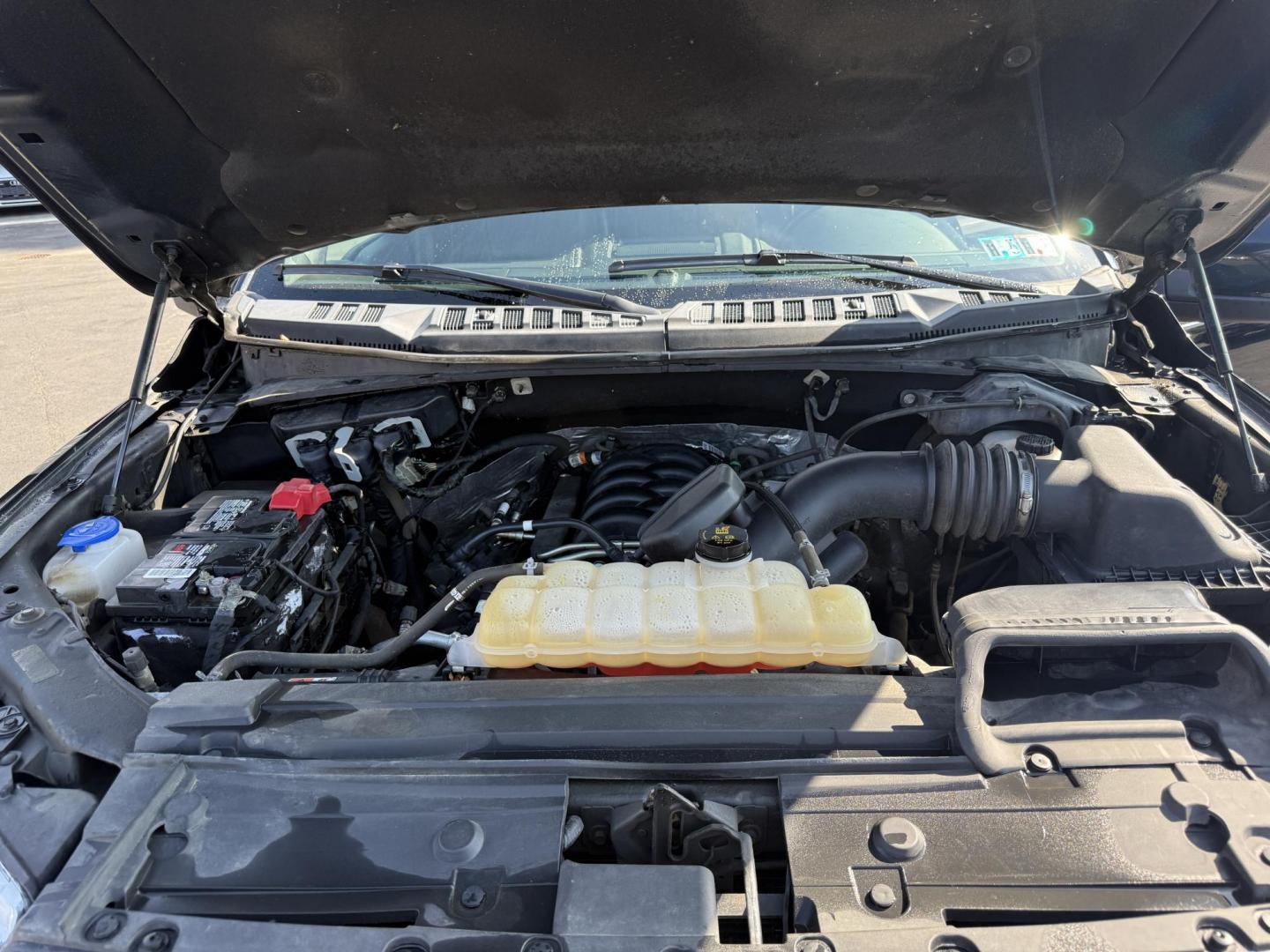 2018 Black /Black Ford F-150 Lariat SuperCrew 5.5-ft. 4WD (1FTEW1E54JF) with an 5.0L V8 OHV 32V FFV engine, 10 Speed Auto transmission, located at 11115 Chardon Rd. , Chardon, OH, 44024, (440) 214-9705, 41.580246, -81.241943 - This 2018 Ford F-150 Lariat Crew Cab 4WD, equipped with the 5.0L Coyote V8 and 10-speed automatic transmission, blends strong performance (395 hp, 400 lb-ft) with luxury features like leather, heated/cooled power seats, dual-zone climate, and advanced tech (Apple CarPlay, Android Auto, navigation). - Photo#16