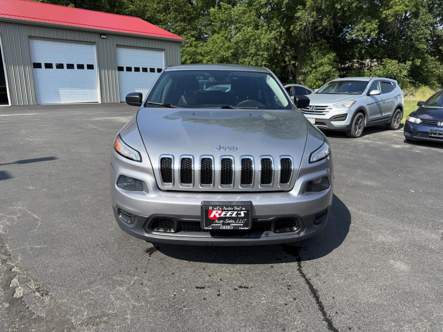 2016 Silver /Black Jeep Cherokee Sport 4WD (1C4PJMAS5GW) with an 3.2L V6 DOHC 24V engine, 9A transmission, located at 547 E. Main St., Orwell, OH, 44076, (440) 437-5893, 41.535435, -80.847855 - Photo#1