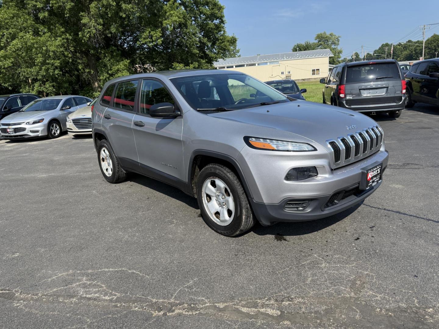 2016 Silver /Black Jeep Cherokee Sport 4WD (1C4PJMAS5GW) with an 3.2L V6 DOHC 24V engine, 9A transmission, located at 547 E. Main St., Orwell, OH, 44076, (440) 437-5893, 41.535435, -80.847855 - Photo#2