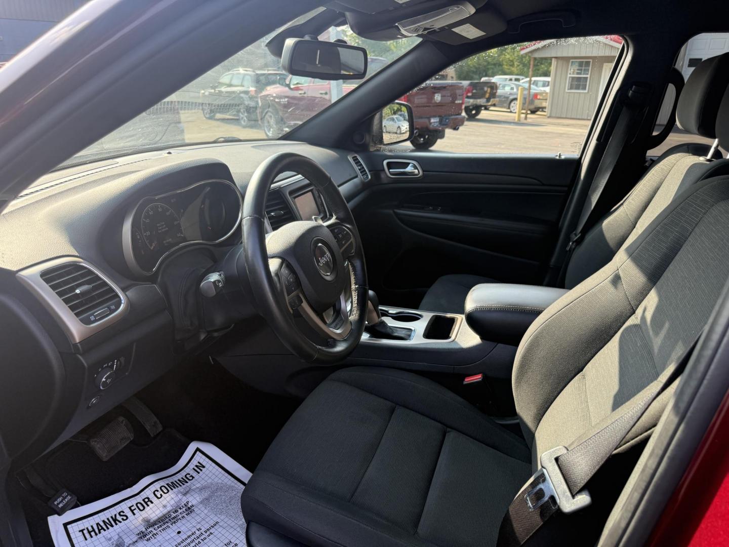 2016 Red /Black Jeep Grand Cherokee Laredo E 4WD (1C4RJFAG4GC) with an 3.6L V6 DOHC 24V engine, 8A transmission, located at 547 E. Main St., Orwell, OH, 44076, (440) 437-5893, 41.535435, -80.847855 - This One Owner 2016 Jeep Grand Cherokee Laredo E 4WD comes equipped with a 3.6L Pentastar V6 engine and an 8-speed automatic transmission, providing a solid balance of power and efficiency. It features a power driver's seat, dual-zone automatic climate control, a 5.0" touchscreen, a 7.0" gauge clust - Photo#14