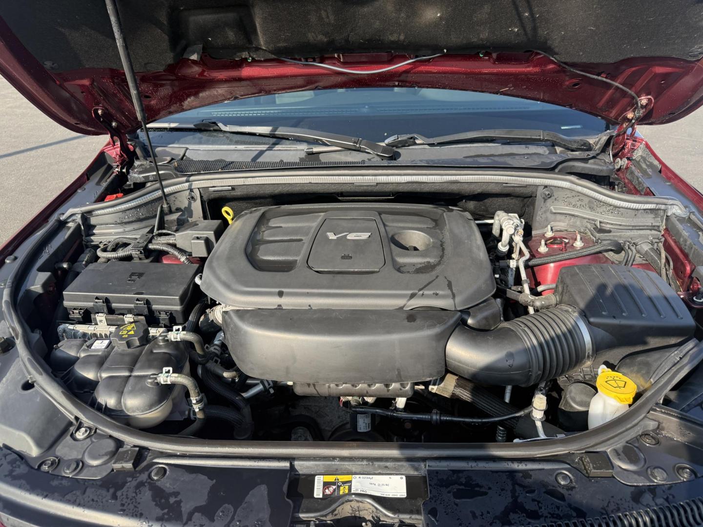 2016 Red /Black Jeep Grand Cherokee Laredo E 4WD (1C4RJFAG4GC) with an 3.6L V6 DOHC 24V engine, 8A transmission, located at 547 E. Main St., Orwell, OH, 44076, (440) 437-5893, 41.535435, -80.847855 - This One Owner 2016 Jeep Grand Cherokee Laredo E 4WD comes equipped with a 3.6L Pentastar V6 engine and an 8-speed automatic transmission, providing a solid balance of power and efficiency. It features a power driver's seat, dual-zone automatic climate control, a 5.0" touchscreen, a 7.0" gauge clust - Photo#13