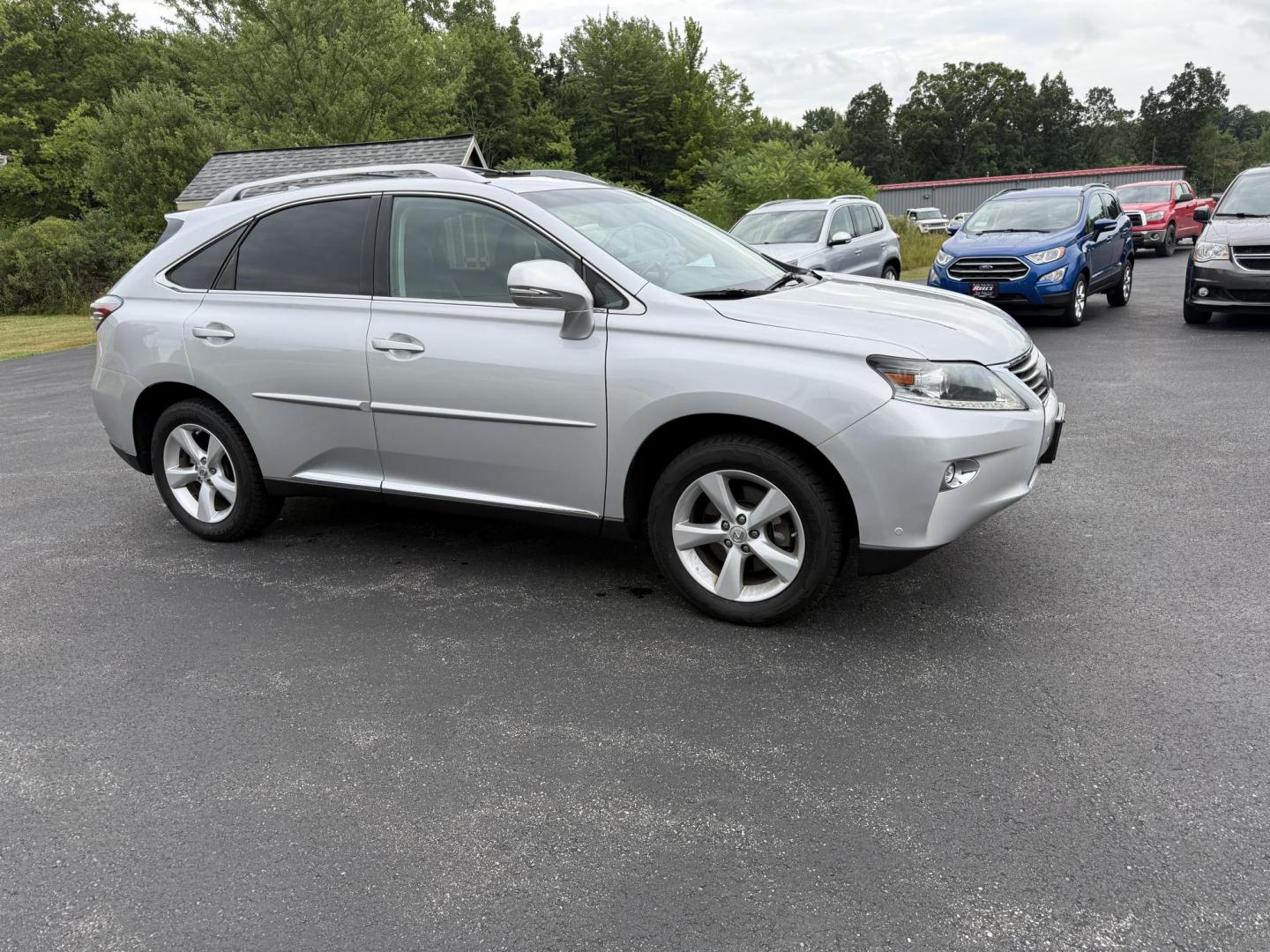 2015 Silver /Black Lexus RX 350 AWD (2T2BK1BA4FC) with an 3.5L V6 DOHC 24V engine, 6-Speed Automatic transmission, located at 11115 Chardon Rd. , Chardon, OH, 44024, (440) 214-9705, 41.580246, -81.241943 - This One Owner 2015 Lexus RX 350 AWD is a luxury midsize SUV powered by a 3.5L 2GR-FE V6 engine with a 6-speed automatic transmission, offering a refined driving experience and reliable performance. It boasts a premium leather interior with heated and cooled front seats, dual-zone automatic climate - Photo#3