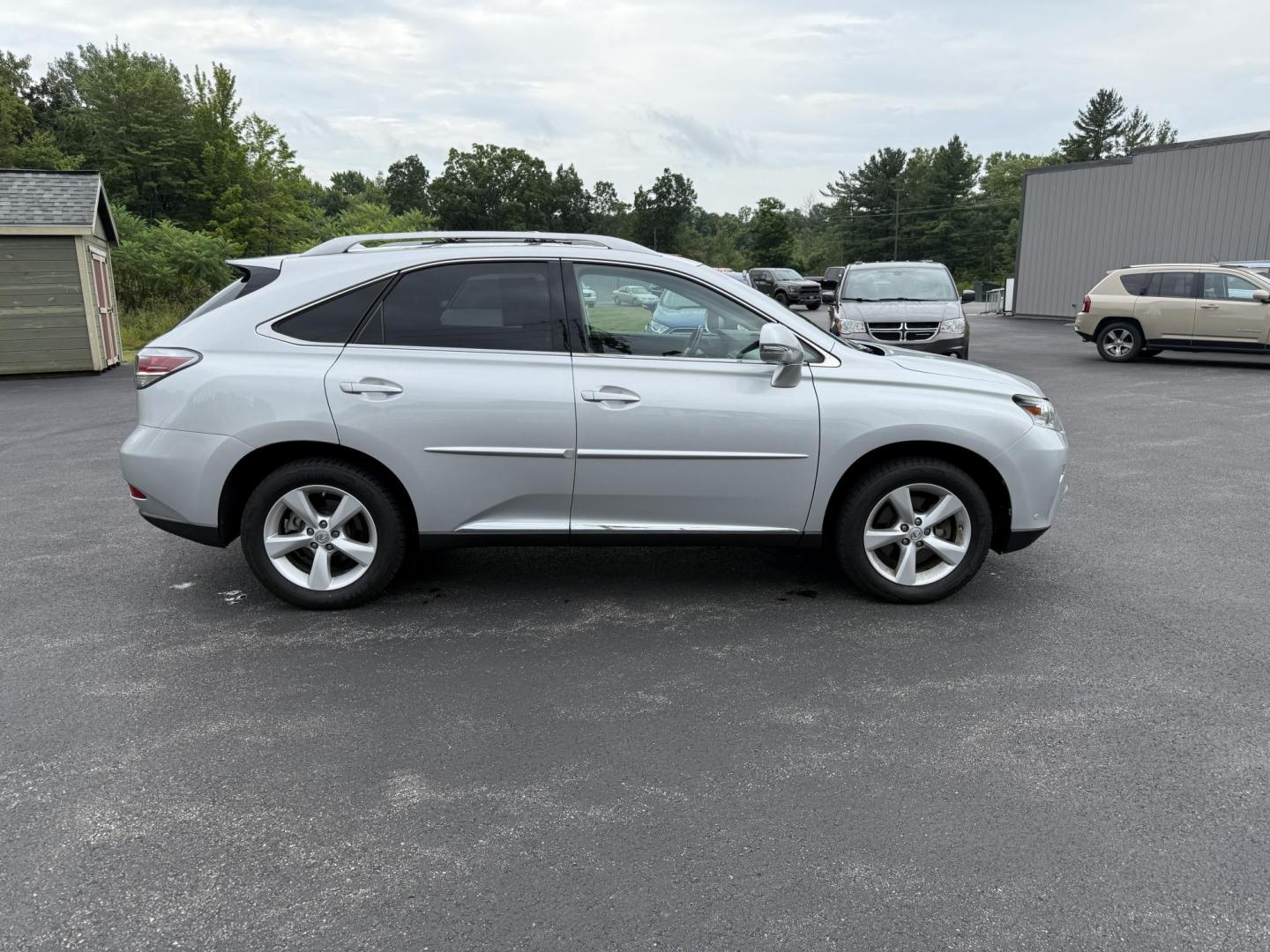 2015 Silver /Black Lexus RX 350 AWD (2T2BK1BA4FC) with an 3.5L V6 DOHC 24V engine, 6-Speed Automatic transmission, located at 11115 Chardon Rd. , Chardon, OH, 44024, (440) 214-9705, 41.580246, -81.241943 - This One Owner 2015 Lexus RX 350 AWD is a luxury midsize SUV powered by a 3.5L 2GR-FE V6 engine with a 6-speed automatic transmission, offering a refined driving experience and reliable performance. It boasts a premium leather interior with heated and cooled front seats, dual-zone automatic climate - Photo#5