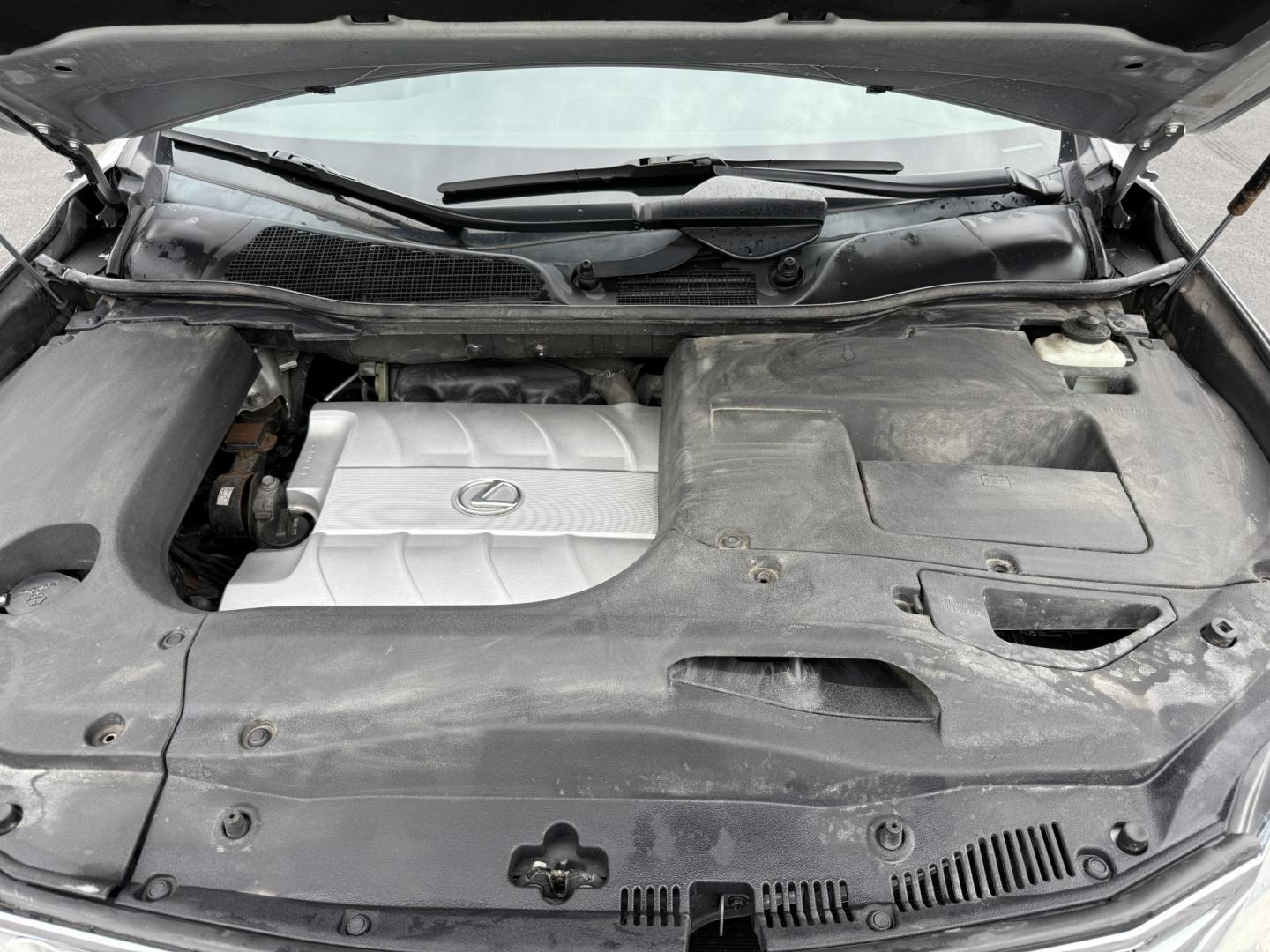 2015 Silver /Black Lexus RX 350 AWD (2T2BK1BA4FC) with an 3.5L V6 DOHC 24V engine, 6-Speed Automatic transmission, located at 11115 Chardon Rd. , Chardon, OH, 44024, (440) 214-9705, 41.580246, -81.241943 - This One Owner 2015 Lexus RX 350 AWD is a luxury midsize SUV powered by a 3.5L 2GR-FE V6 engine with a 6-speed automatic transmission, offering a refined driving experience and reliable performance. It boasts a premium leather interior with heated and cooled front seats, dual-zone automatic climate - Photo#14