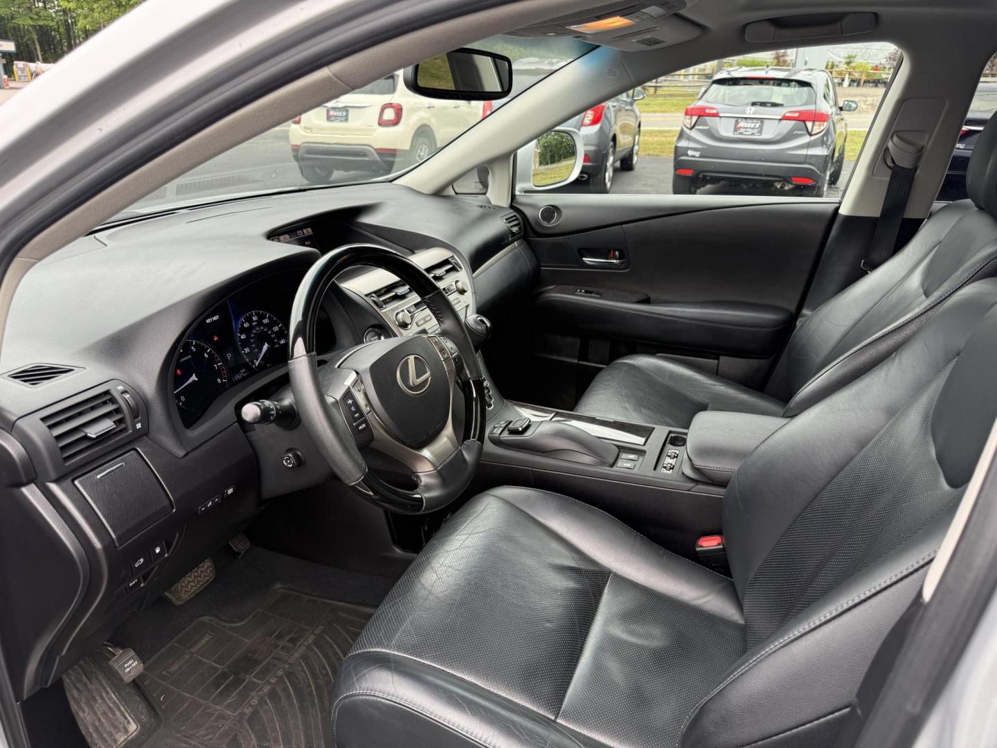 2015 Silver /Black Lexus RX 350 AWD (2T2BK1BA4FC) with an 3.5L V6 DOHC 24V engine, 6-Speed Automatic transmission, located at 11115 Chardon Rd. , Chardon, OH, 44024, (440) 214-9705, 41.580246, -81.241943 - This One Owner 2015 Lexus RX 350 AWD is a luxury midsize SUV powered by a 3.5L 2GR-FE V6 engine with a 6-speed automatic transmission, offering a refined driving experience and reliable performance. It boasts a premium leather interior with heated and cooled front seats, dual-zone automatic climate - Photo#15