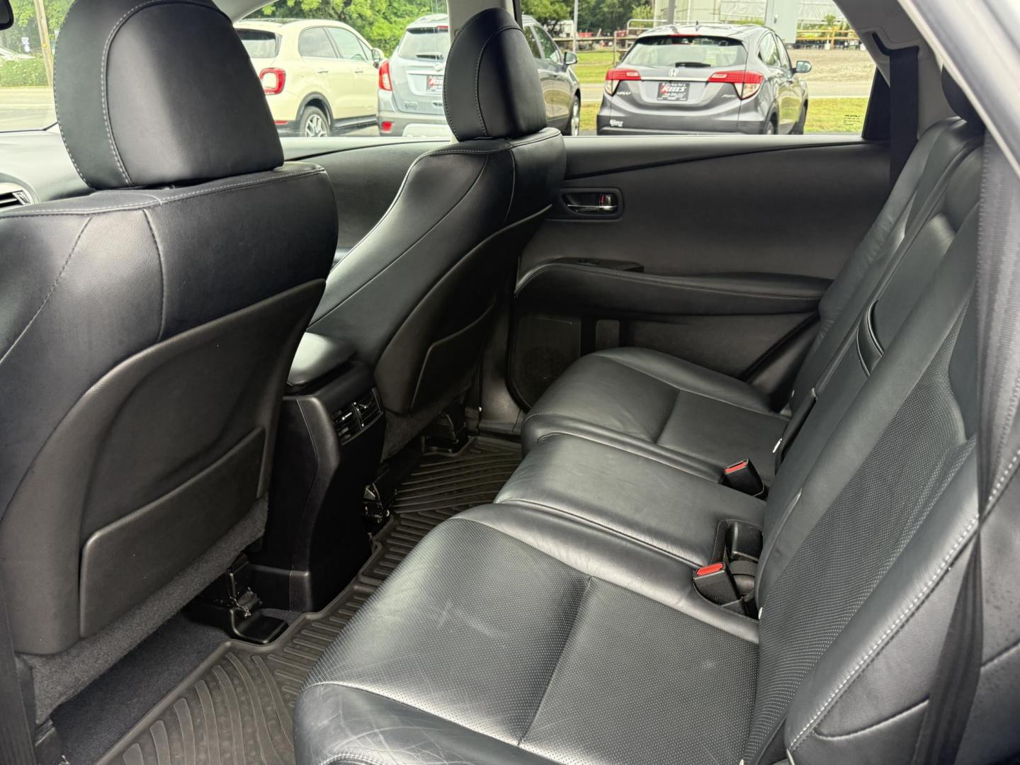 2015 Silver /Black Lexus RX 350 AWD (2T2BK1BA4FC) with an 3.5L V6 DOHC 24V engine, 6-Speed Automatic transmission, located at 11115 Chardon Rd. , Chardon, OH, 44024, (440) 214-9705, 41.580246, -81.241943 - This One Owner 2015 Lexus RX 350 AWD is a luxury midsize SUV powered by a 3.5L 2GR-FE V6 engine with a 6-speed automatic transmission, offering a refined driving experience and reliable performance. It boasts a premium leather interior with heated and cooled front seats, dual-zone automatic climate - Photo#34