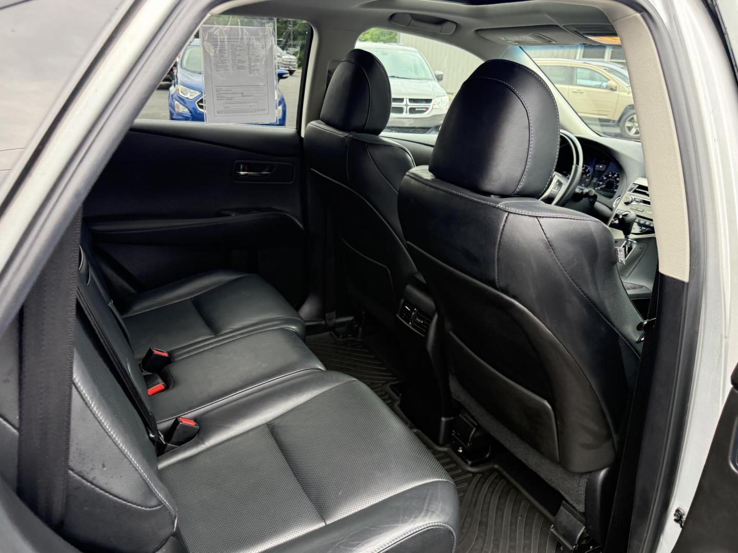 2015 Silver /Black Lexus RX 350 AWD (2T2BK1BA4FC) with an 3.5L V6 DOHC 24V engine, 6-Speed Automatic transmission, located at 11115 Chardon Rd. , Chardon, OH, 44024, (440) 214-9705, 41.580246, -81.241943 - This One Owner 2015 Lexus RX 350 AWD is a luxury midsize SUV powered by a 3.5L 2GR-FE V6 engine with a 6-speed automatic transmission, offering a refined driving experience and reliable performance. It boasts a premium leather interior with heated and cooled front seats, dual-zone automatic climate - Photo#42
