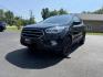 2018 Black /Black Ford Escape SE 4WD (1FMCU9GD6JU) with an 1.5L I4 DOHC 16V Turbo engine, 6A transmission, located at 547 E. Main St., Orwell, OH, 44076, (440) 437-5893, 41.535435, -80.847855 - This 2018 Ford Escape SE 4WD features a 1.5L turbocharged EcoBoost I4 engine paired with a 6-speed automatic transmission, delivering a good balance of power and efficiency (up to 28 MPG highway). It offers comfort and convenience with a power driver’s seat, heated front seats, dual-zone automatic - Photo#0