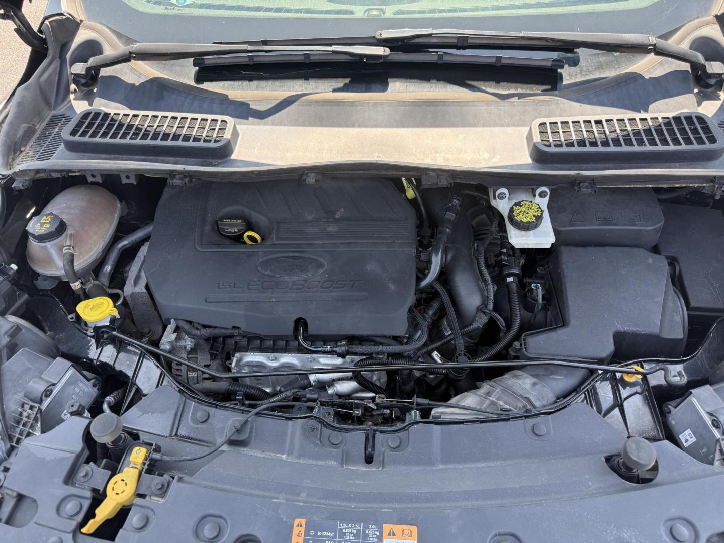 2018 Black /Black Ford Escape SE 4WD (1FMCU9GD6JU) with an 1.5L I4 DOHC 16V Turbo engine, 6A transmission, located at 547 E. Main St., Orwell, OH, 44076, (440) 437-5893, 41.535435, -80.847855 - This 2018 Ford Escape SE 4WD features a 1.5L turbocharged EcoBoost I4 engine paired with a 6-speed automatic transmission, delivering a good balance of power and efficiency (up to 28 MPG highway). It offers comfort and convenience with a power driver’s seat, heated front seats, dual-zone automatic - Photo#14