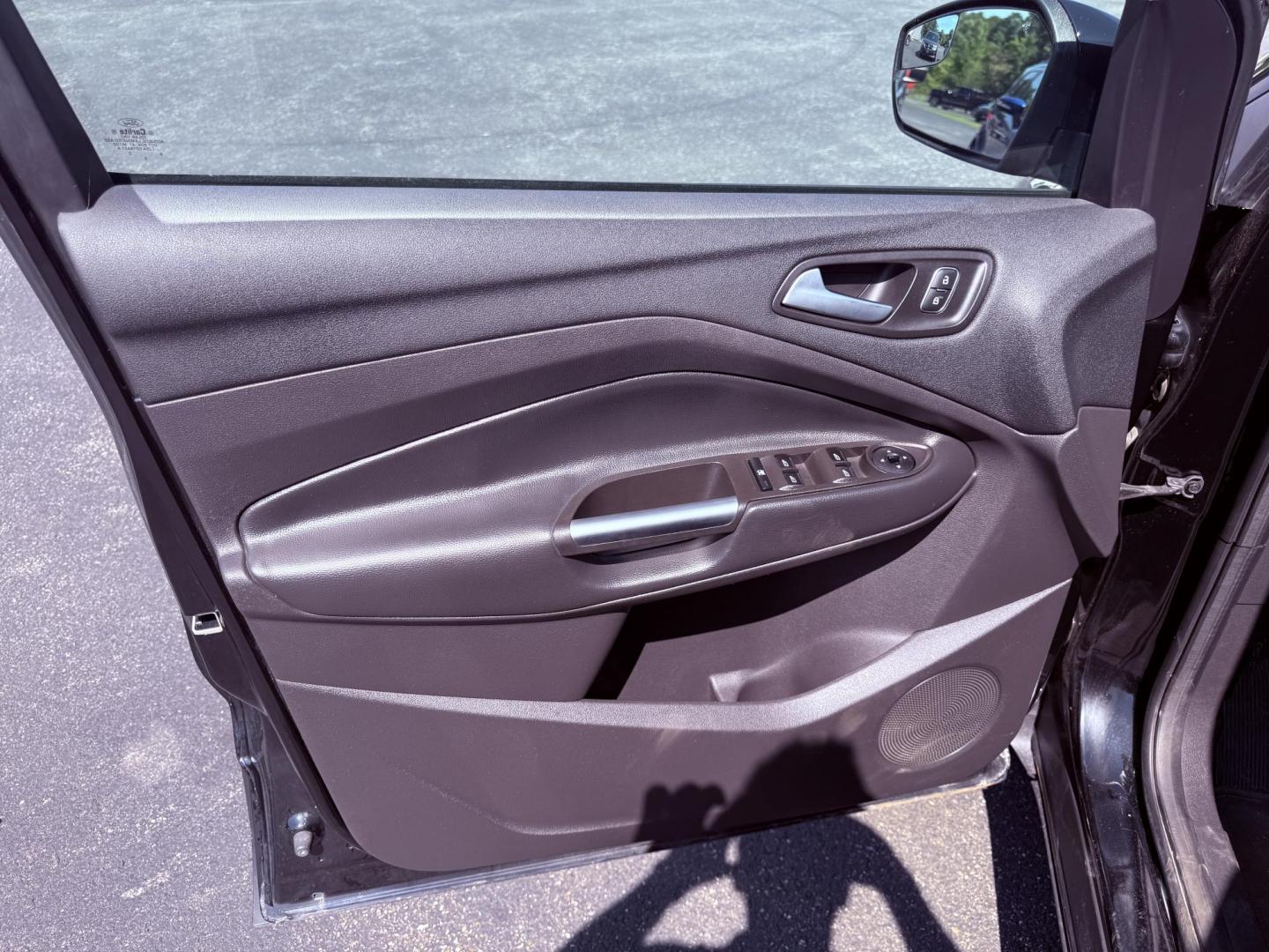 2018 Black /Black Ford Escape SE 4WD (1FMCU9GD6JU) with an 1.5L I4 DOHC 16V Turbo engine, 6A transmission, located at 547 E. Main St., Orwell, OH, 44076, (440) 437-5893, 41.535435, -80.847855 - This 2018 Ford Escape SE 4WD features a 1.5L turbocharged EcoBoost I4 engine paired with a 6-speed automatic transmission, delivering a good balance of power and efficiency (up to 28 MPG highway). It offers comfort and convenience with a power driver’s seat, heated front seats, dual-zone automatic - Photo#18