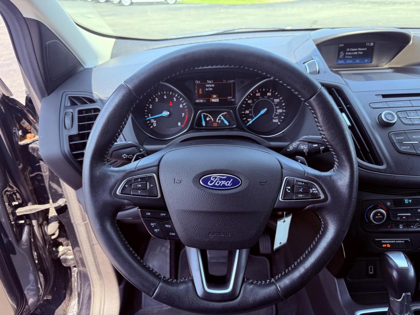 2018 Black /Black Ford Escape SE 4WD (1FMCU9GD6JU) with an 1.5L I4 DOHC 16V Turbo engine, 6A transmission, located at 547 E. Main St., Orwell, OH, 44076, (440) 437-5893, 41.535435, -80.847855 - This 2018 Ford Escape SE 4WD features a 1.5L turbocharged EcoBoost I4 engine paired with a 6-speed automatic transmission, delivering a good balance of power and efficiency (up to 28 MPG highway). It offers comfort and convenience with a power driver’s seat, heated front seats, dual-zone automatic - Photo#24