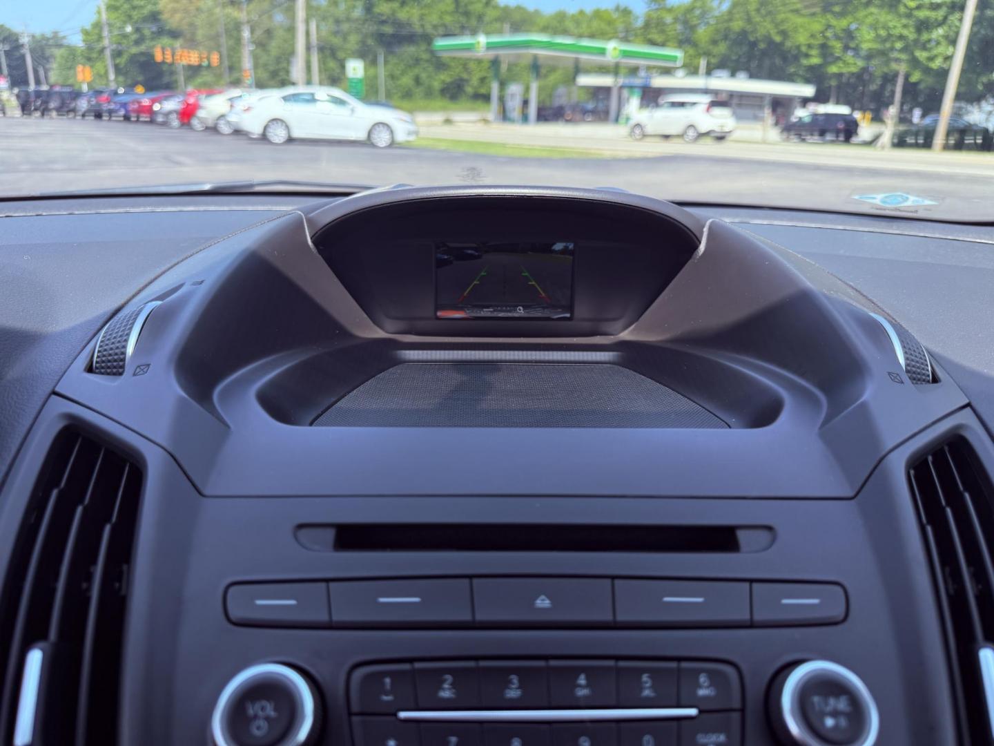 2018 Black /Black Ford Escape SE 4WD (1FMCU9GD6JU) with an 1.5L I4 DOHC 16V Turbo engine, 6A transmission, located at 547 E. Main St., Orwell, OH, 44076, (440) 437-5893, 41.535435, -80.847855 - This 2018 Ford Escape SE 4WD features a 1.5L turbocharged EcoBoost I4 engine paired with a 6-speed automatic transmission, delivering a good balance of power and efficiency (up to 28 MPG highway). It offers comfort and convenience with a power driver’s seat, heated front seats, dual-zone automatic - Photo#26