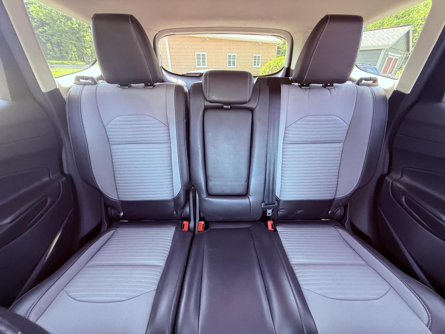 2018 Black /Black Ford Escape SE 4WD (1FMCU9GD6JU) with an 1.5L I4 DOHC 16V Turbo engine, 6A transmission, located at 547 E. Main St., Orwell, OH, 44076, (440) 437-5893, 41.535435, -80.847855 - This 2018 Ford Escape SE 4WD features a 1.5L turbocharged EcoBoost I4 engine paired with a 6-speed automatic transmission, delivering a good balance of power and efficiency (up to 28 MPG highway). It offers comfort and convenience with a power driver’s seat, heated front seats, dual-zone automatic - Photo#30