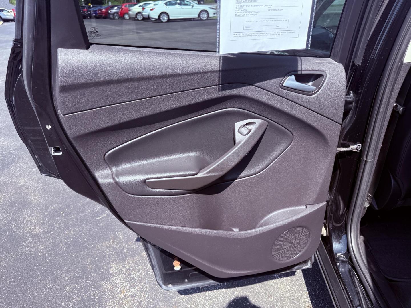 2018 Black /Black Ford Escape SE 4WD (1FMCU9GD6JU) with an 1.5L I4 DOHC 16V Turbo engine, 6A transmission, located at 547 E. Main St., Orwell, OH, 44076, (440) 437-5893, 41.535435, -80.847855 - This 2018 Ford Escape SE 4WD features a 1.5L turbocharged EcoBoost I4 engine paired with a 6-speed automatic transmission, delivering a good balance of power and efficiency (up to 28 MPG highway). It offers comfort and convenience with a power driver’s seat, heated front seats, dual-zone automatic - Photo#32