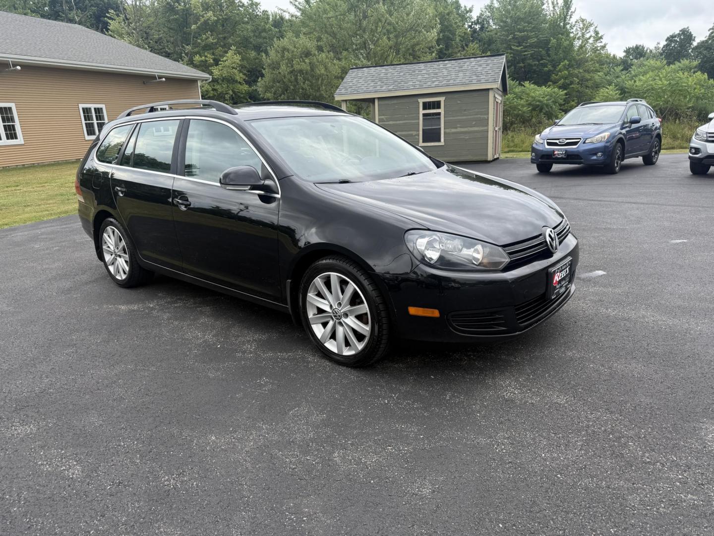 2014 Black /Black Volkswagen Jetta SportWagen 2.0L TDI (3VWPL7AJ9EM) with an 2.0L I4 SOHC 16V TURBO DIESEL engine, 6 Speed Auto transmission, located at 11115 Chardon Rd. , Chardon, OH, 44024, (440) 214-9705, 41.580246, -81.241943 - This 2014 Volkswagen Jetta SportWagen TDI is a versatile diesel-powered wagon featuring a 2.0L turbocharged I4 engine and 6-speed automatic transmission, delivering strong torque and impressive fuel economy at up to 37 MPG highway. Well-equipped for comfort and convenience, it includes leather inte - Photo#2