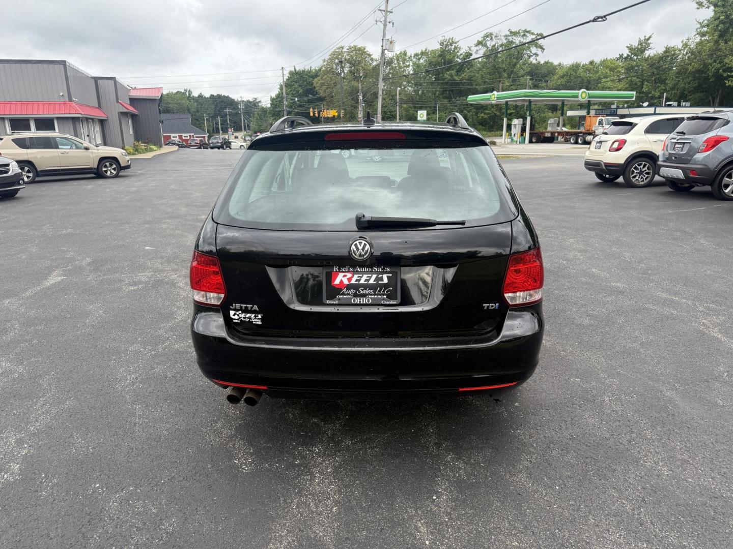 2014 Black /Black Volkswagen Jetta SportWagen 2.0L TDI (3VWPL7AJ9EM) with an 2.0L I4 SOHC 16V TURBO DIESEL engine, 6 Speed Auto transmission, located at 11115 Chardon Rd. , Chardon, OH, 44024, (440) 214-9705, 41.580246, -81.241943 - This 2014 Volkswagen Jetta SportWagen TDI is a versatile diesel-powered wagon featuring a 2.0L turbocharged I4 engine and 6-speed automatic transmission, delivering strong torque and impressive fuel economy at up to 37 MPG highway. Well-equipped for comfort and convenience, it includes leather inte - Photo#8