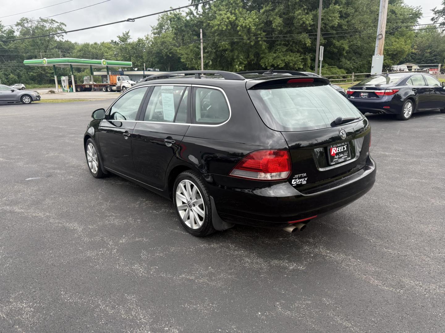 2014 Black /Black Volkswagen Jetta SportWagen 2.0L TDI (3VWPL7AJ9EM) with an 2.0L I4 SOHC 16V TURBO DIESEL engine, 6 Speed Auto transmission, located at 11115 Chardon Rd. , Chardon, OH, 44024, (440) 214-9705, 41.580246, -81.241943 - This 2014 Volkswagen Jetta SportWagen TDI is a versatile diesel-powered wagon featuring a 2.0L turbocharged I4 engine and 6-speed automatic transmission, delivering strong torque and impressive fuel economy at up to 37 MPG highway. Well-equipped for comfort and convenience, it includes leather inte - Photo#9