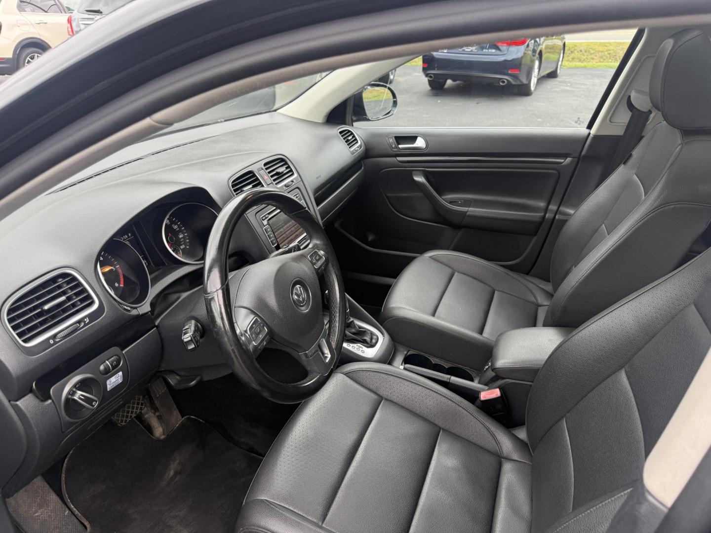 2014 Black /Black Volkswagen Jetta SportWagen 2.0L TDI (3VWPL7AJ9EM) with an 2.0L I4 SOHC 16V TURBO DIESEL engine, 6 Speed Auto transmission, located at 11115 Chardon Rd. , Chardon, OH, 44024, (440) 214-9705, 41.580246, -81.241943 - This 2014 Volkswagen Jetta SportWagen TDI is a versatile diesel-powered wagon featuring a 2.0L turbocharged I4 engine and 6-speed automatic transmission, delivering strong torque and impressive fuel economy at up to 37 MPG highway. Well-equipped for comfort and convenience, it includes leather inte - Photo#15