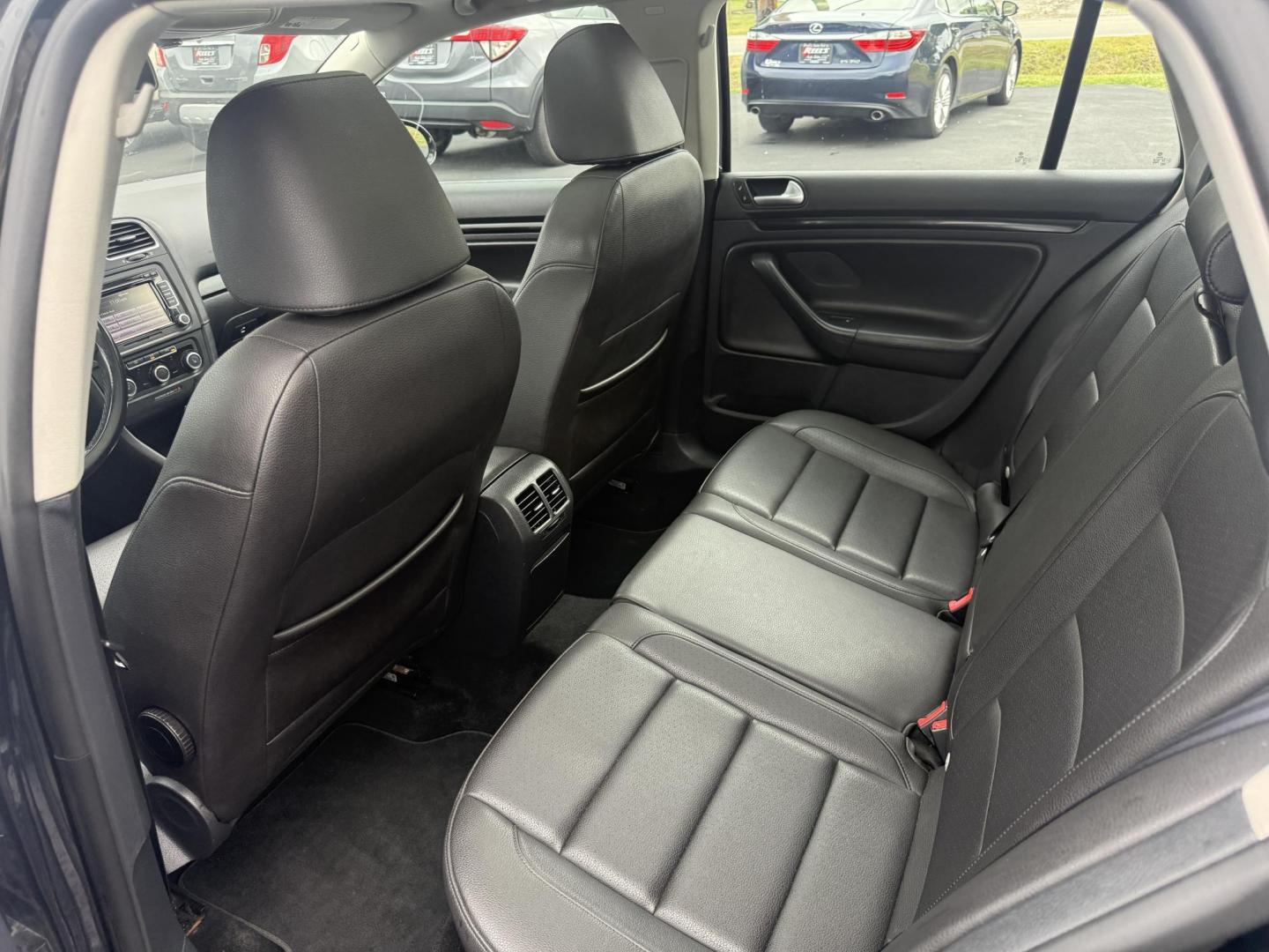2014 Black /Black Volkswagen Jetta SportWagen 2.0L TDI (3VWPL7AJ9EM) with an 2.0L I4 SOHC 16V TURBO DIESEL engine, 6 Speed Auto transmission, located at 11115 Chardon Rd. , Chardon, OH, 44024, (440) 214-9705, 41.580246, -81.241943 - This 2014 Volkswagen Jetta SportWagen TDI is a versatile diesel-powered wagon featuring a 2.0L turbocharged I4 engine and 6-speed automatic transmission, delivering strong torque and impressive fuel economy at up to 37 MPG highway. Well-equipped for comfort and convenience, it includes leather inte - Photo#29
