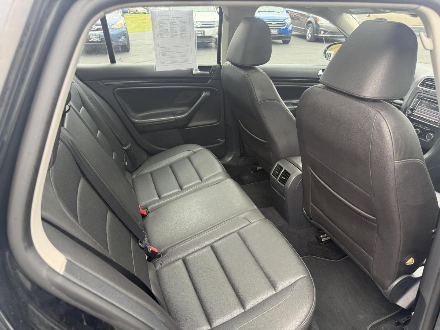 2014 Black /Black Volkswagen Jetta SportWagen 2.0L TDI (3VWPL7AJ9EM) with an 2.0L I4 SOHC 16V TURBO DIESEL engine, 6 Speed Auto transmission, located at 11115 Chardon Rd. , Chardon, OH, 44024, (440) 214-9705, 41.580246, -81.241943 - This 2014 Volkswagen Jetta SportWagen TDI is a versatile diesel-powered wagon featuring a 2.0L turbocharged I4 engine and 6-speed automatic transmission, delivering strong torque and impressive fuel economy at up to 37 MPG highway. Well-equipped for comfort and convenience, it includes leather inte - Photo#35