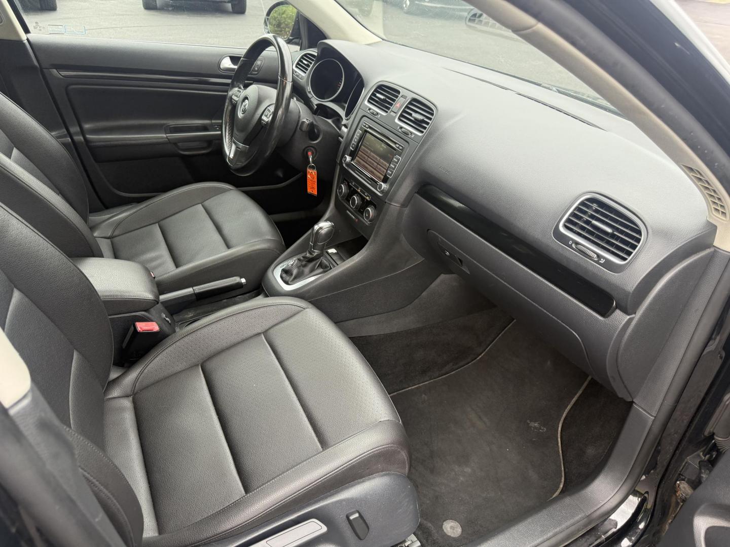2014 Black /Black Volkswagen Jetta SportWagen 2.0L TDI (3VWPL7AJ9EM) with an 2.0L I4 SOHC 16V TURBO DIESEL engine, 6 Speed Auto transmission, located at 11115 Chardon Rd. , Chardon, OH, 44024, (440) 214-9705, 41.580246, -81.241943 - This 2014 Volkswagen Jetta SportWagen TDI is a versatile diesel-powered wagon featuring a 2.0L turbocharged I4 engine and 6-speed automatic transmission, delivering strong torque and impressive fuel economy at up to 37 MPG highway. Well-equipped for comfort and convenience, it includes leather inte - Photo#37