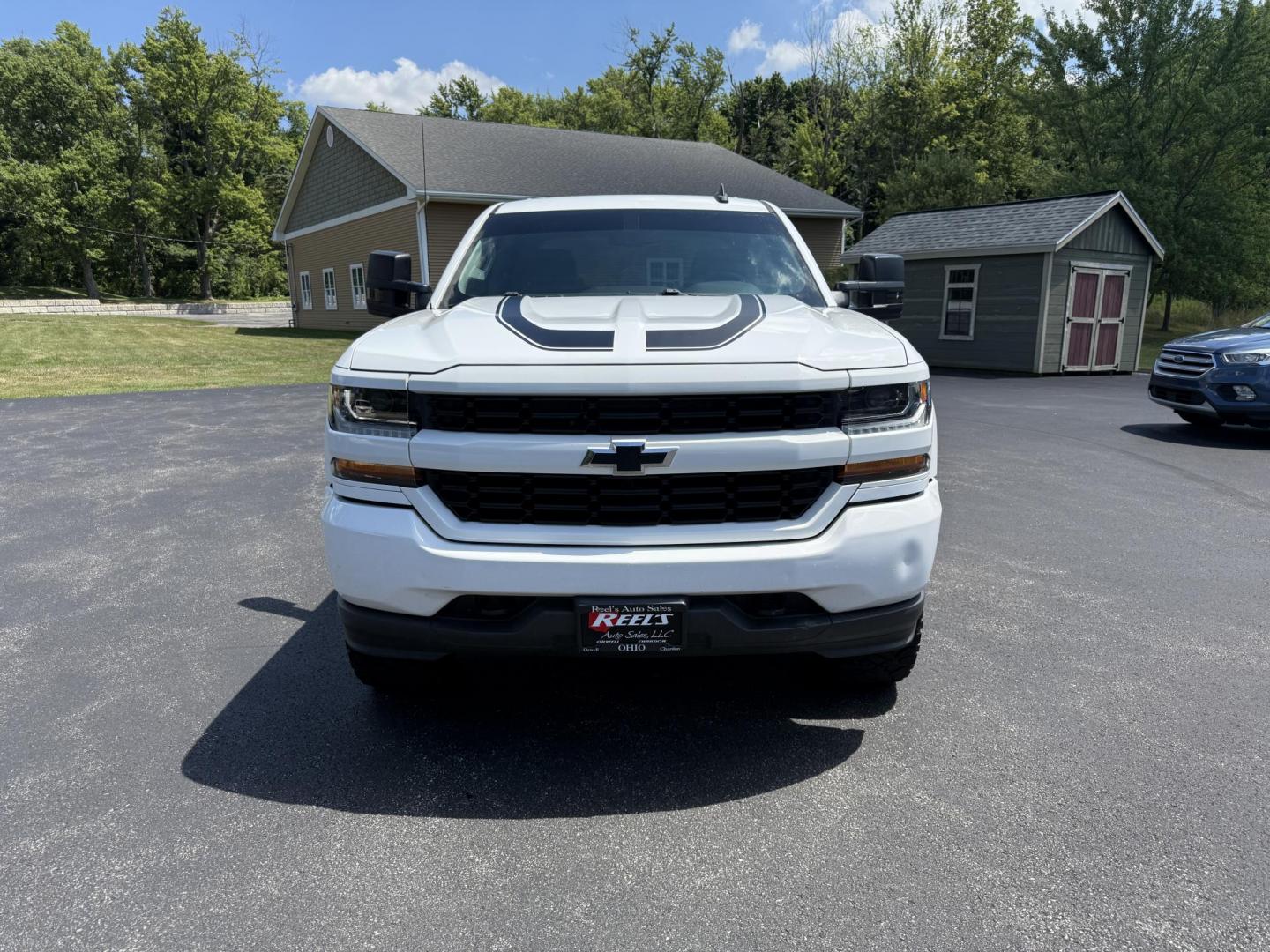 2018 White /Gray Chevrolet Silverado 1500 Custom Crew Cab 4WD (3GCUKPEC7JG) with an 5.3L V8 OHV 16V engine, 6A transmission, located at 11115 Chardon Rd. , Chardon, OH, 44024, (440) 214-9705, 41.580246, -81.241943 - This One Owner 2018 Chevrolet Silverado 1500 Custom Crew Cab with the 5.3L EcoTec3 V8 engine and 6-speed automatic transmission offers solid performance, featuring 3.42 rear axle gearing and the G80 automatic locking rear differential for enhanced traction. With a towing capacity of 9,100 pounds, it - Photo#1
