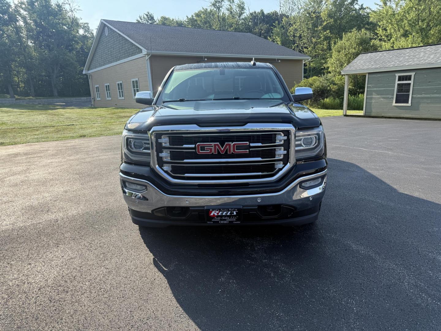2016 Black /Black GMC Sierra 1500 SLT Crew Cab Long Box 4WD (3GTU2NEC2GG) with an 5.3L V8 OHV 16V engine, 6A transmission, located at 11115 Chardon Rd. , Chardon, OH, 44024, (440) 214-9705, 41.580246, -81.241943 - This One Owner 2016 GMC Sierra 1500 SLT Crew Cab 4WD is equipped with a 5.3L EcoTec3 V8 engine and a 6-speed automatic transmission, delivering a strong 9,100-pound towing capacity thanks to its 3.42 gearing. This model features a refined leather interior with heated front seats, an 8.0" touchscreen - Photo#1