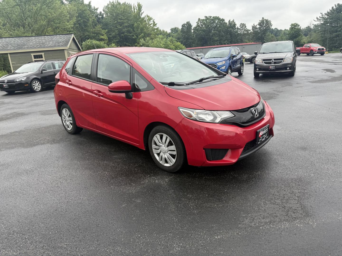 2016 Red /Black Honda Fit LX CVT (JHMGK5H55GX) with an 1.5L I4 SOHC 16V engine, Automatic transmission, located at 11115 Chardon Rd. , Chardon, OH, 44024, (440) 214-9705, 41.580246, -81.241943 - This One Owner 2016 Honda Fit LX is a practical and efficient subcompact hatchback powered by a 1.5L inline-4 engine, delivering impressive fuel economy of up to 40 MPG on the highway. It features a 5.0" center screen, backup camera, daytime running lights, ECO mode for enhanced efficiency, and spor - Photo#2